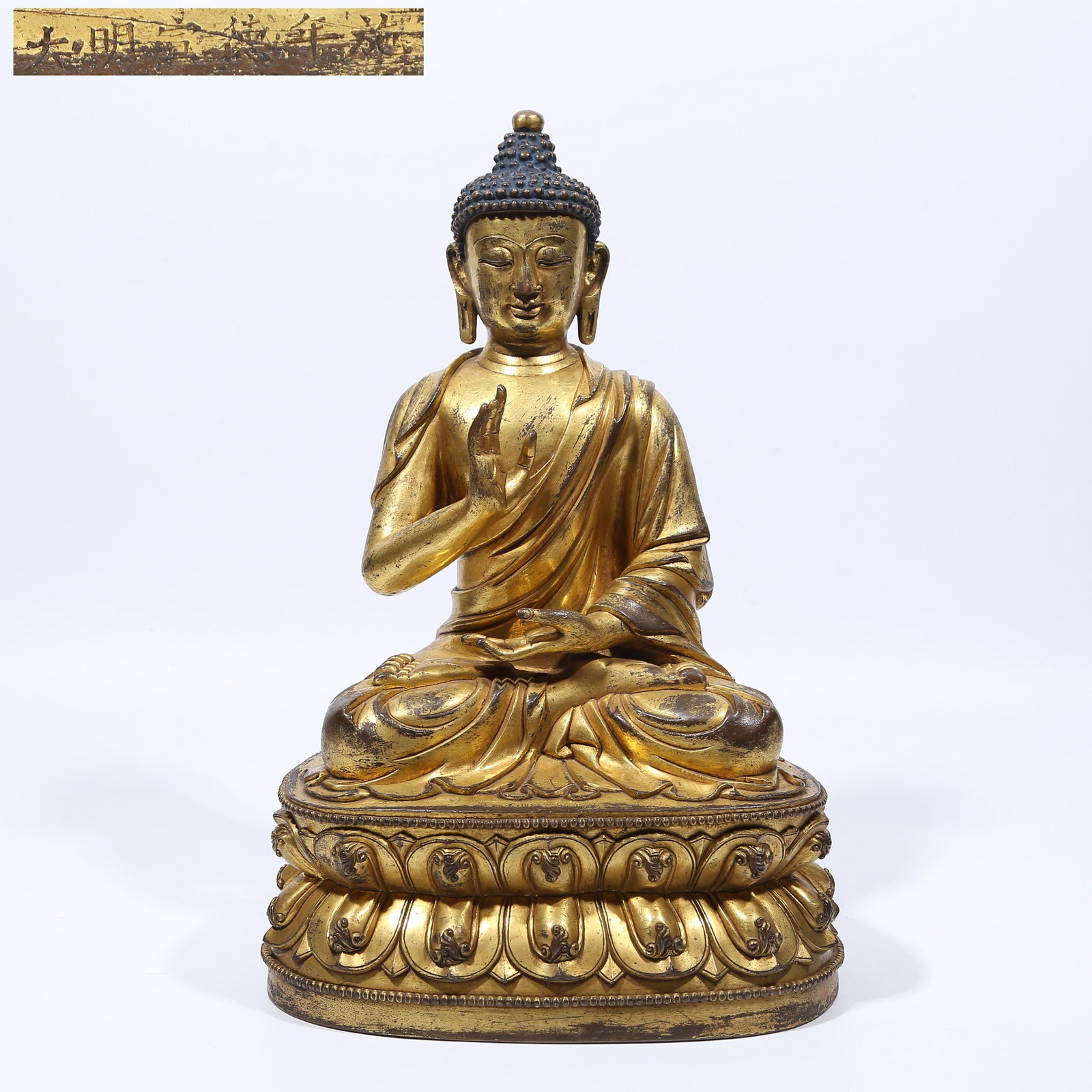 A GILT BRONZE AMOGHASIDDHI BUDDHA STATUE: Gilt Bronze Amoghasiddhi Buddha Statue