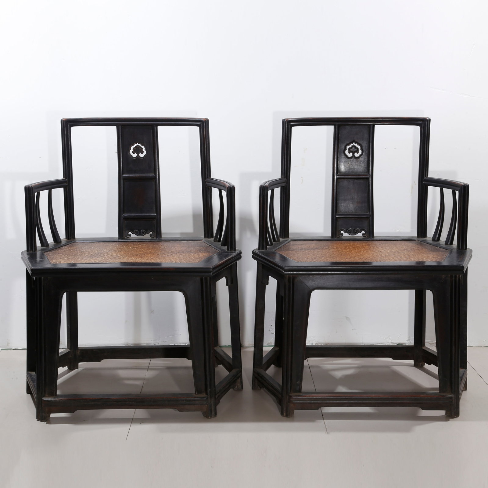 A PAIR OF ZITAN WOOD OFFICIAL'S HAT ARMCHAIRS WITH SIX LEGS: Pair of Zitan Wood Official's Hat Armchairs with Six Legs