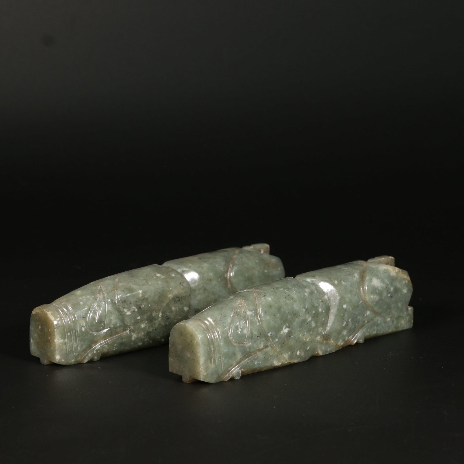 A SET OF HETIAN JADE HAND-GRIPS: Set of Hetian Jade Hand-Grips
