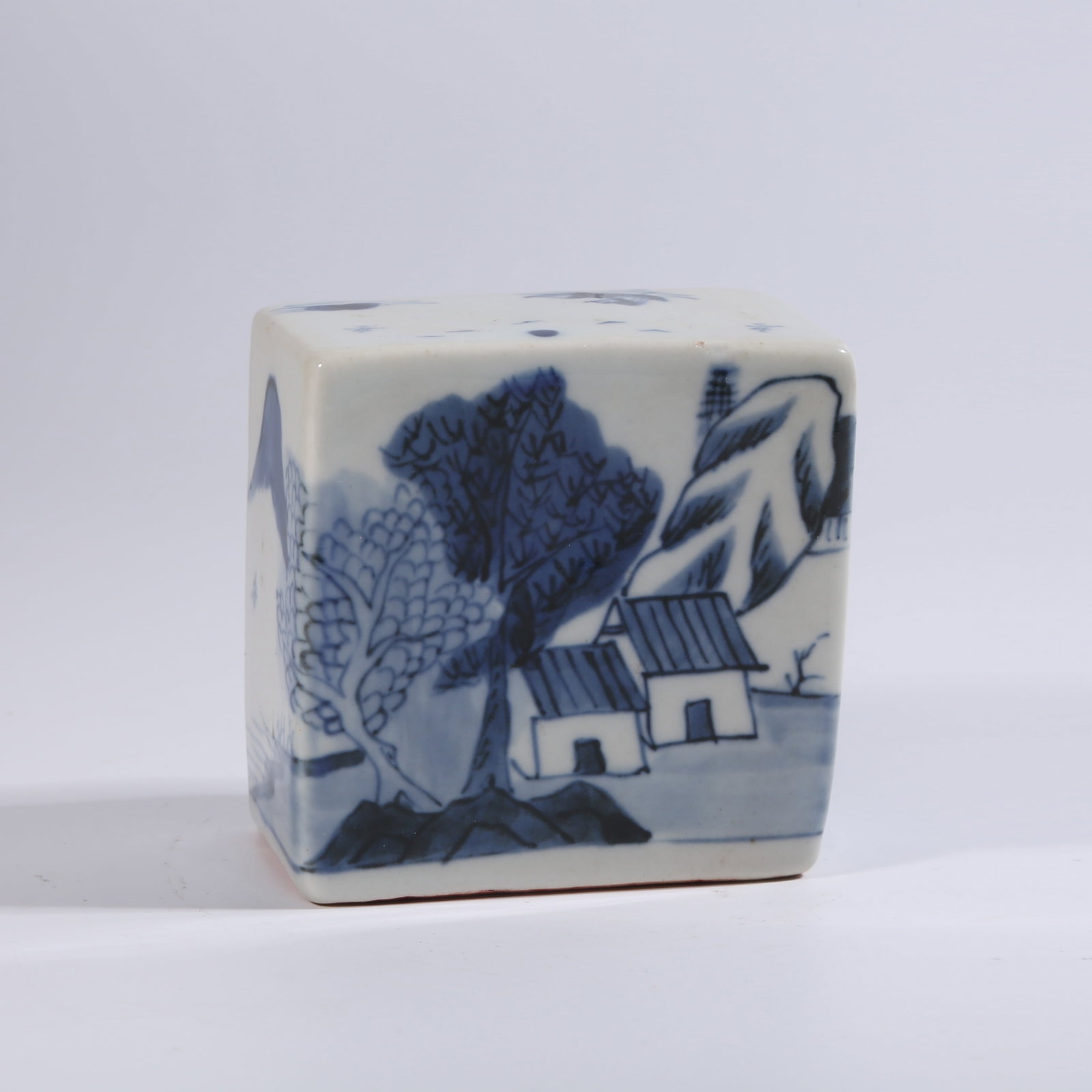 A BLUE-AND-WHITE SEAL WITH LANDSCAPE AND FIGURE PATTERN: Blue-and-White Seal with Landscape and Figure Pattern