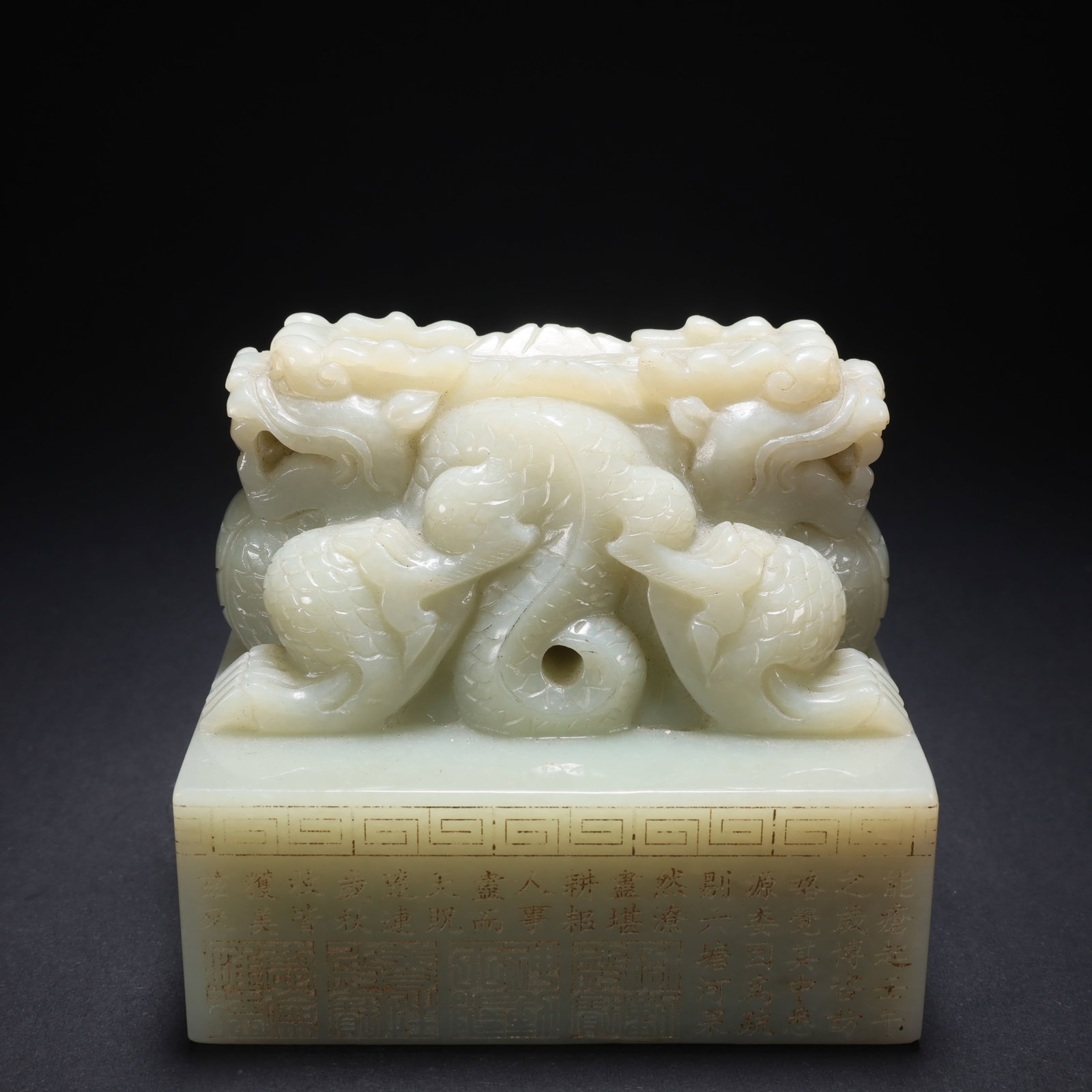 A HETIAN JADE POETRY-INSCRIBED DOUBLE-DRAGON SEAL (1 of 9)