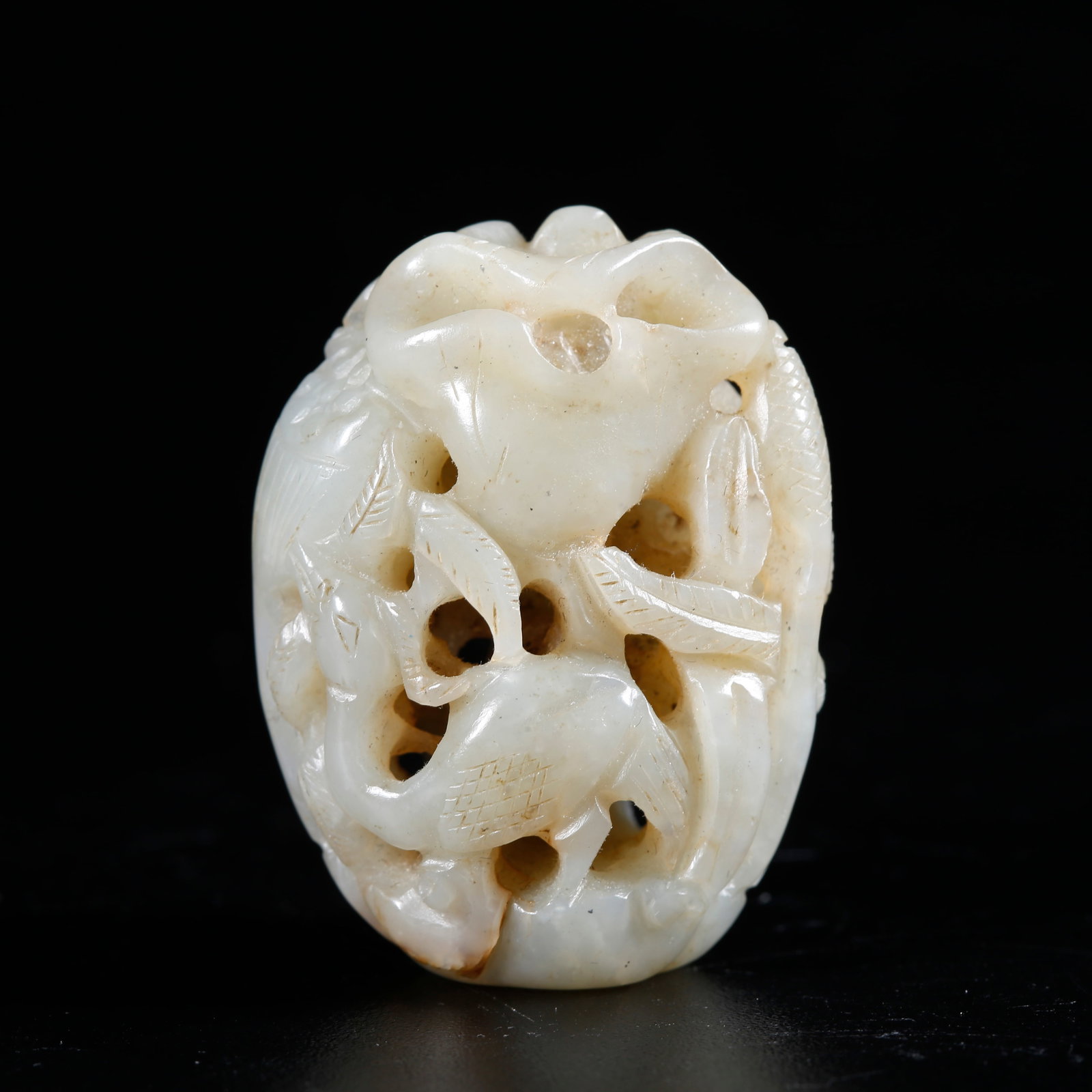 A HETIAN JADE CARVED PENDANT: Hetian Jade Carved Pendant