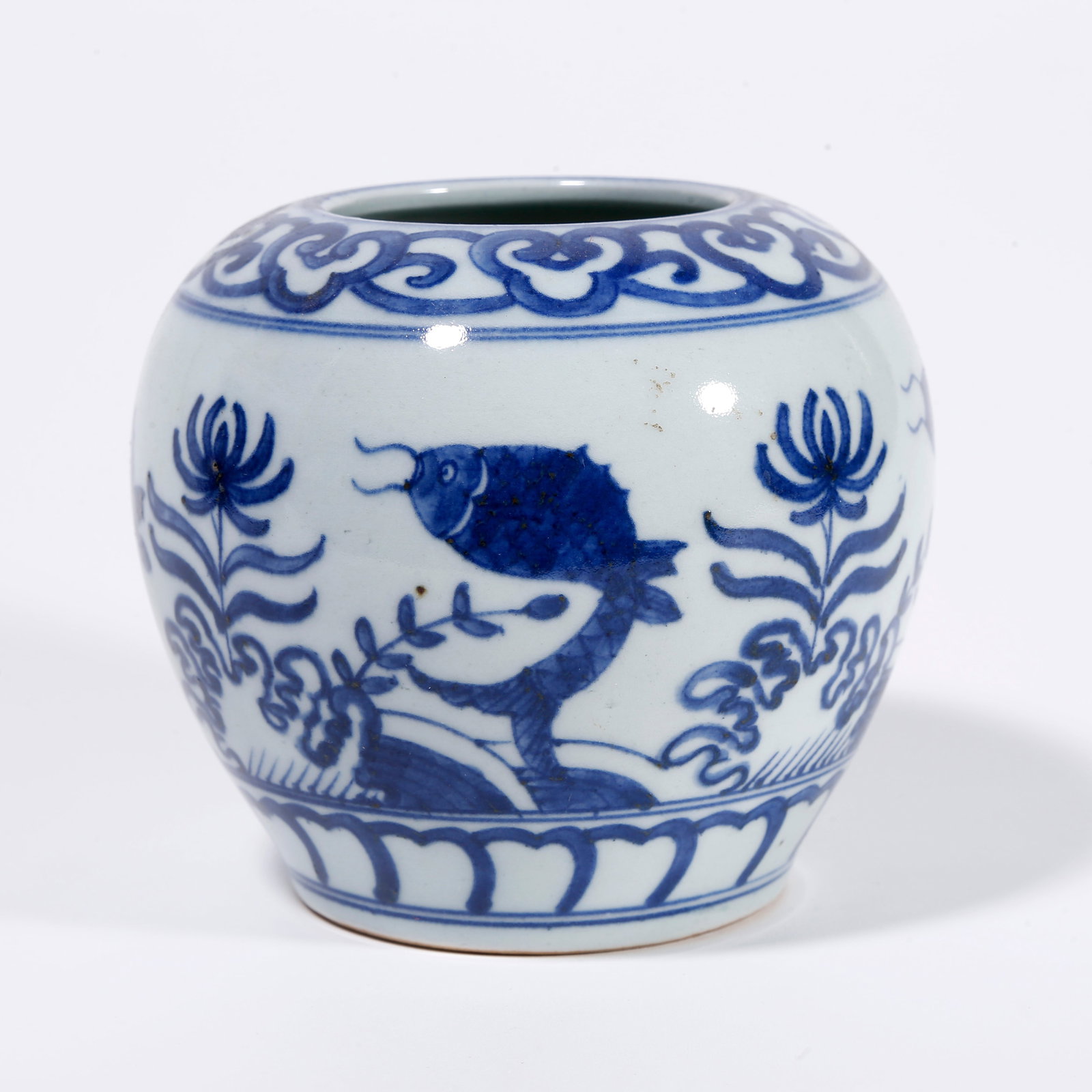 A BLUE AND WHITE JAR WITH FISH AND ALGAE PATTERN (1 of 9)