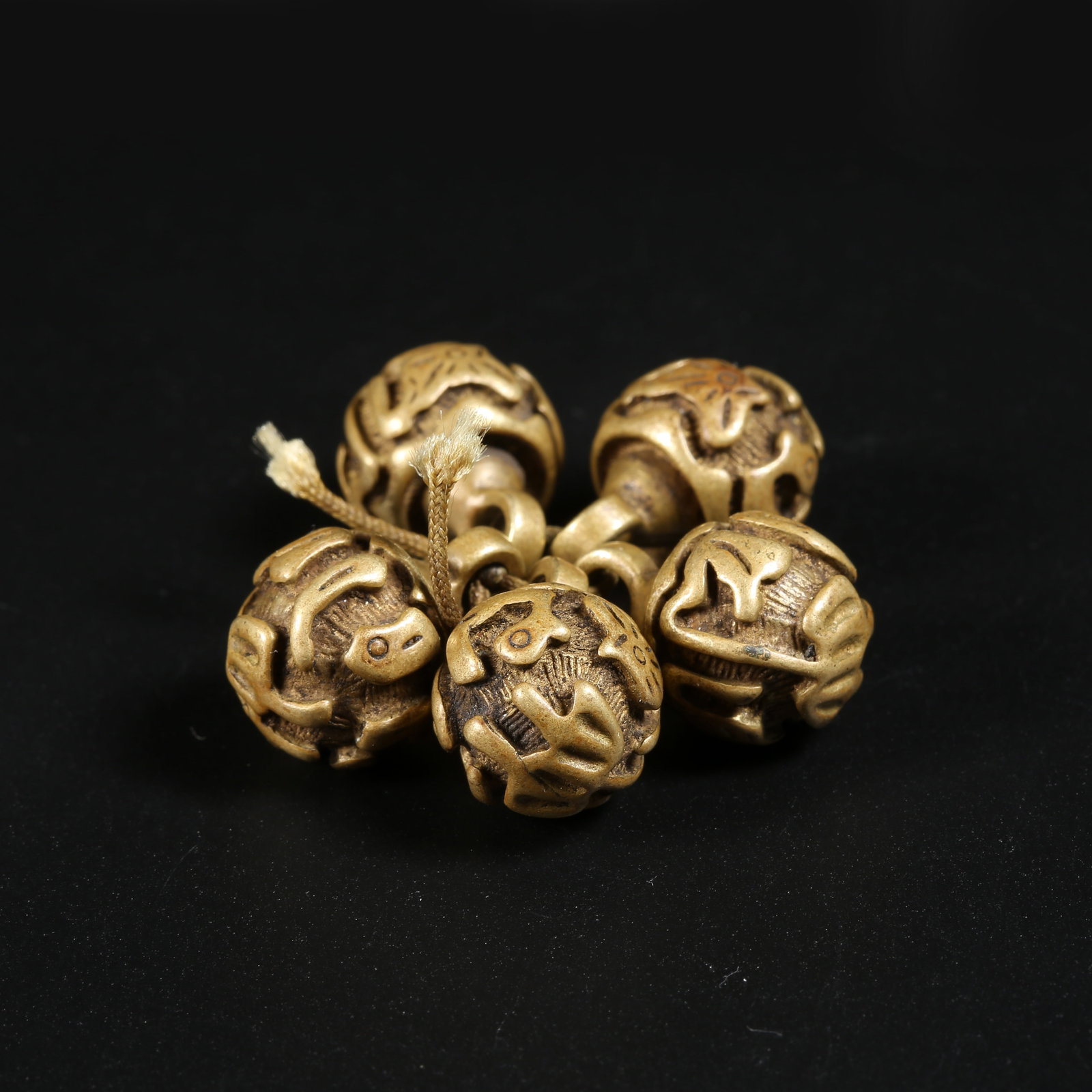 A SET OF GILT-BRONZE BUTTONS: Set of Gilt-Bronze Buttons