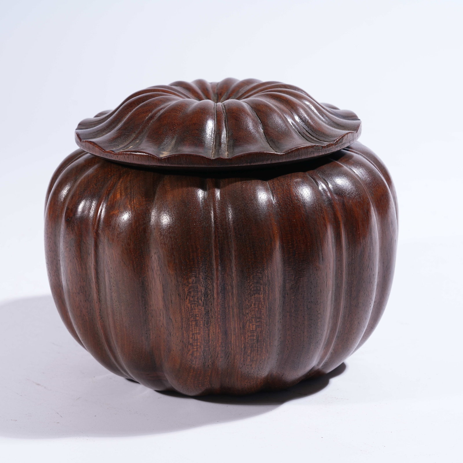 A HUANGHUALI MELON-RIBBED GO STONE CONTAINER (1 of 9)