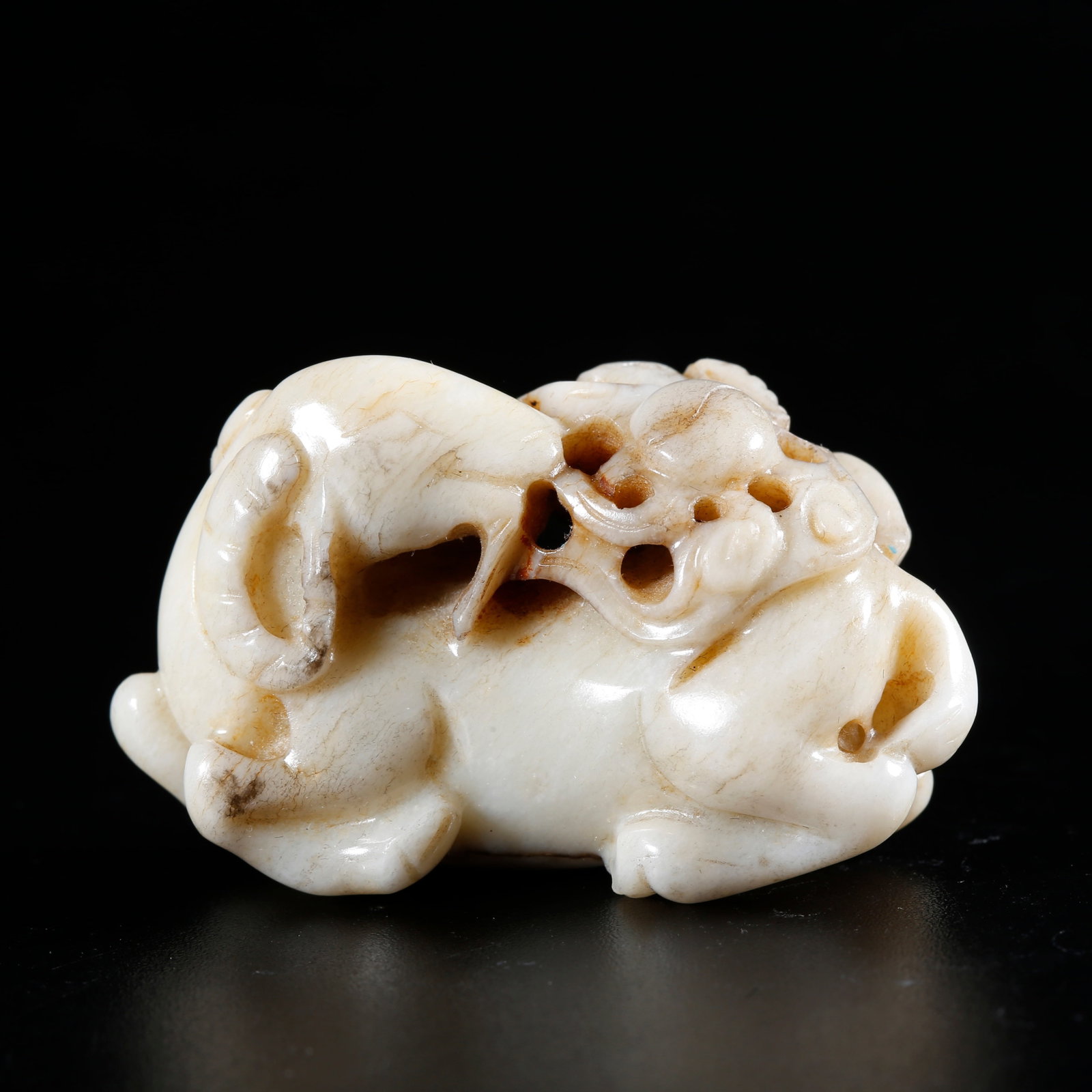 A HETIAN JADE CARVED ORNAMENT OF THREE RAMS BRINGING PROSPERITY (1 of 10)