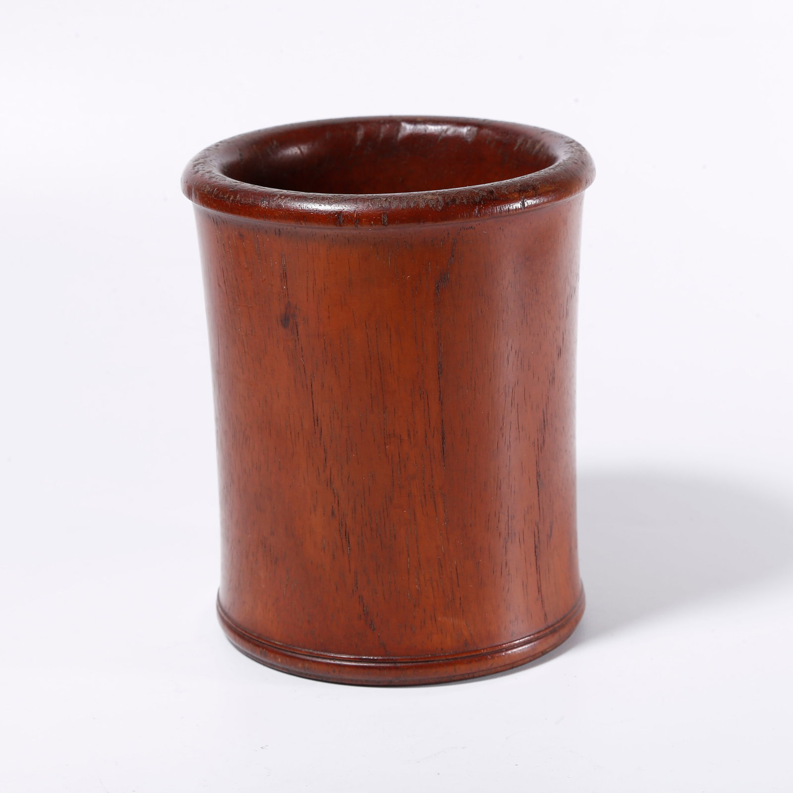 A HUANGHUALI WOOD CARVED BRUSH POT: Huanghuali Wood Carved Brush Pot
