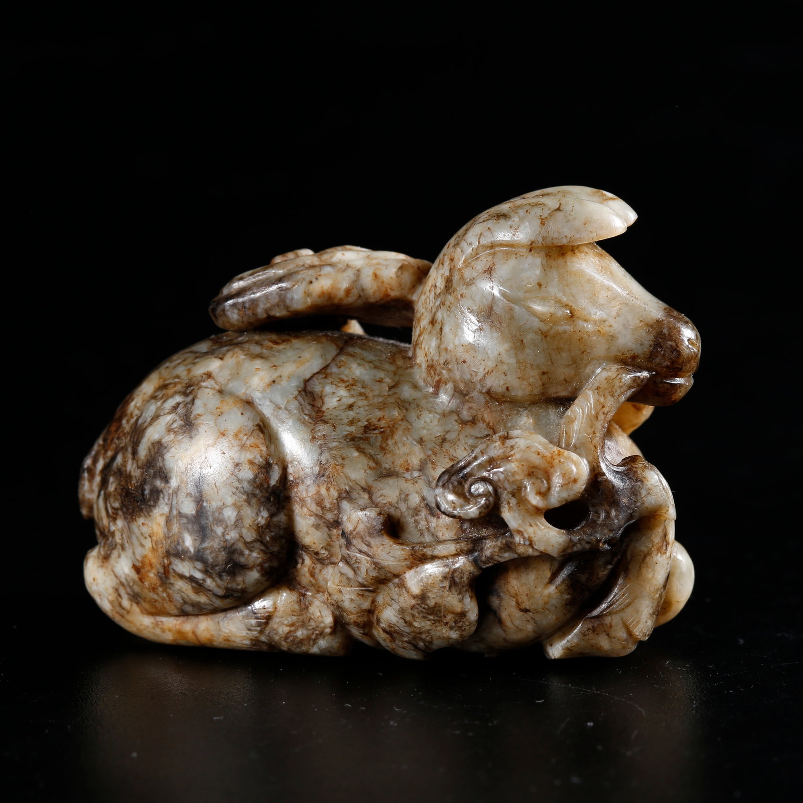 A HETIAN JADE CARVED DEER-SHAPED ORNAMENT: Hetian Jade Carved Deer-shaped Ornament