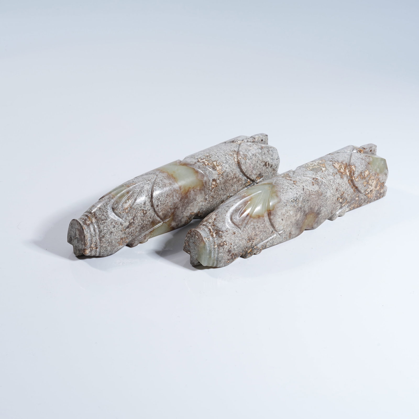 A SET OF ANCIENT JADE HAND-HELD WARES (1 of 10)