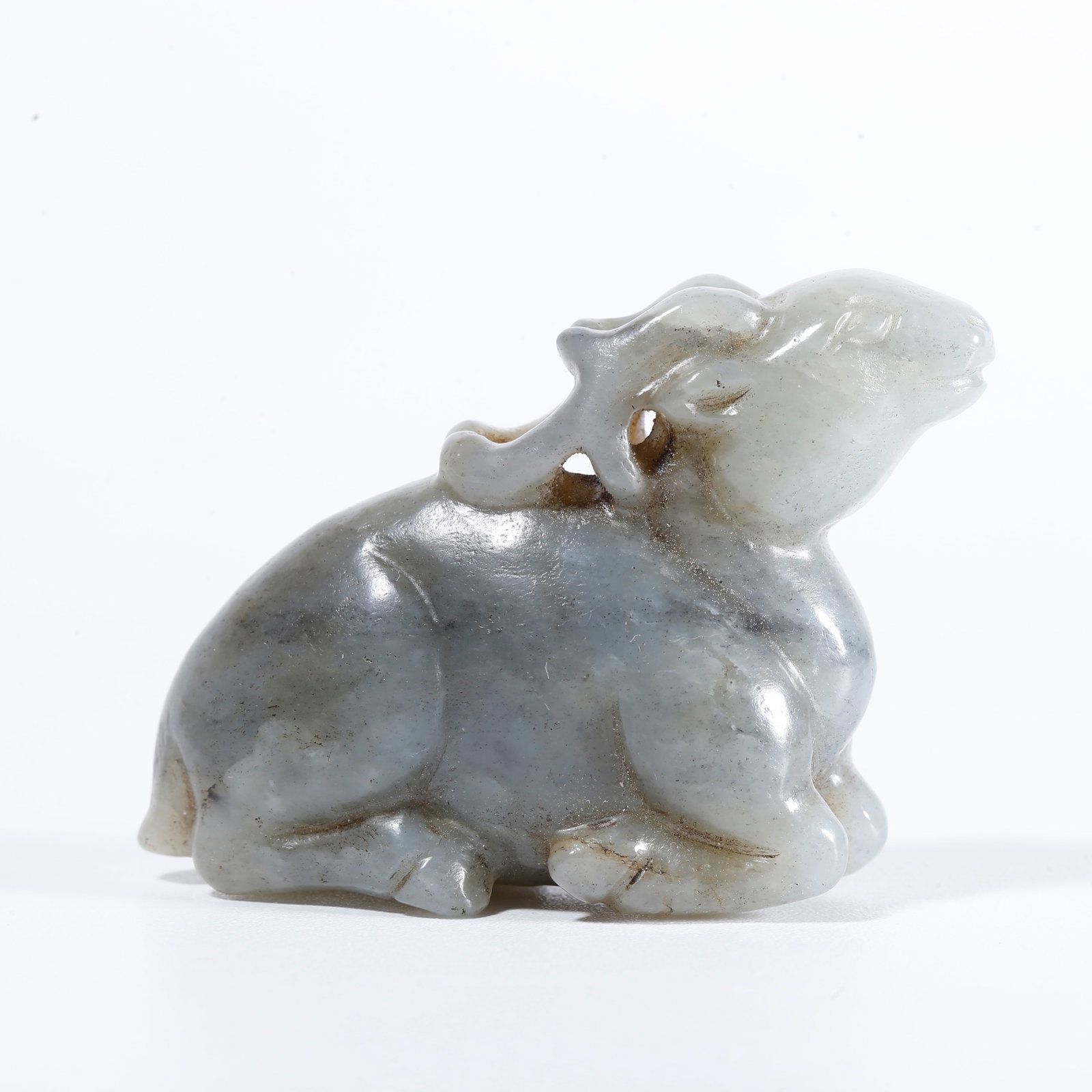 A HOTAN JADE SKILLFULLY CARVED DEER ORNAMENT: Hotan Jade Skillfully Carved Deer Ornament