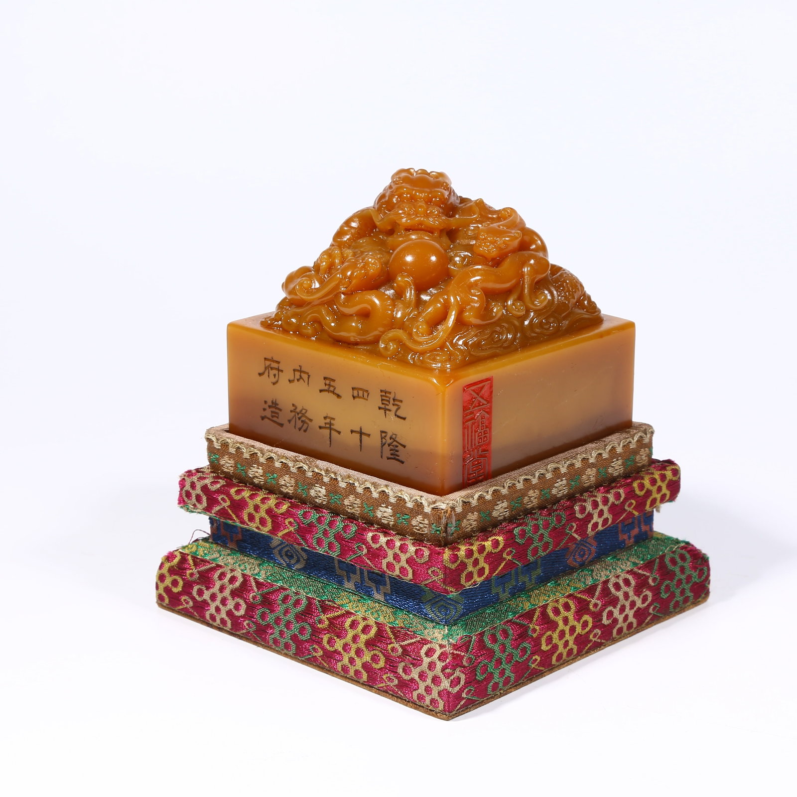 A SHOUSHAN TIANHUANG STONE SEAL WITH DRAGON KNOB: Shoushan Tianhuang stone seal with dragon knob