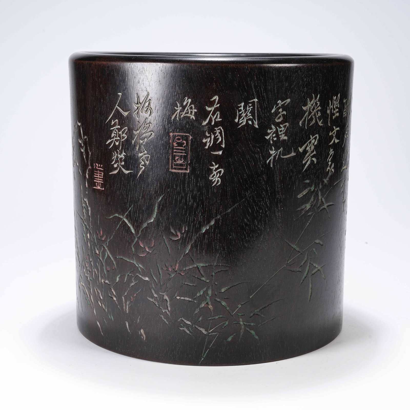 A ZITAN WOOD BRUSH POT WITH EXOTIC ROCK AND FLORAL PATTERN: Zitan Wood Brush Pot with Exotic Rock and Floral Pattern