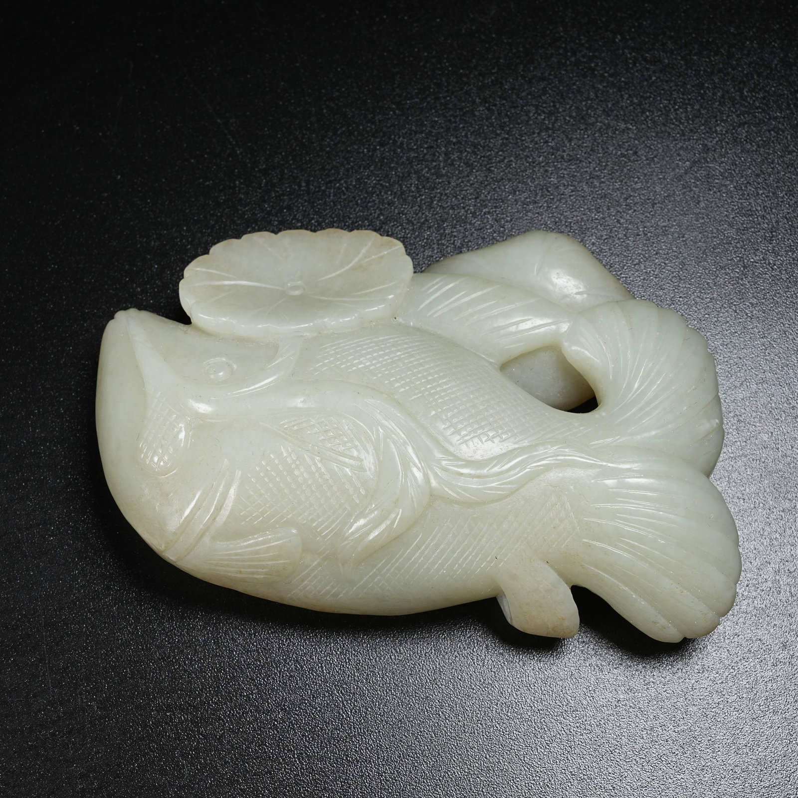 A HOTAN JADE ORNAMENT OF SURPLUS YEAR AFTER YEAR: Hotan Jade Ornament of Surplus Year after Year