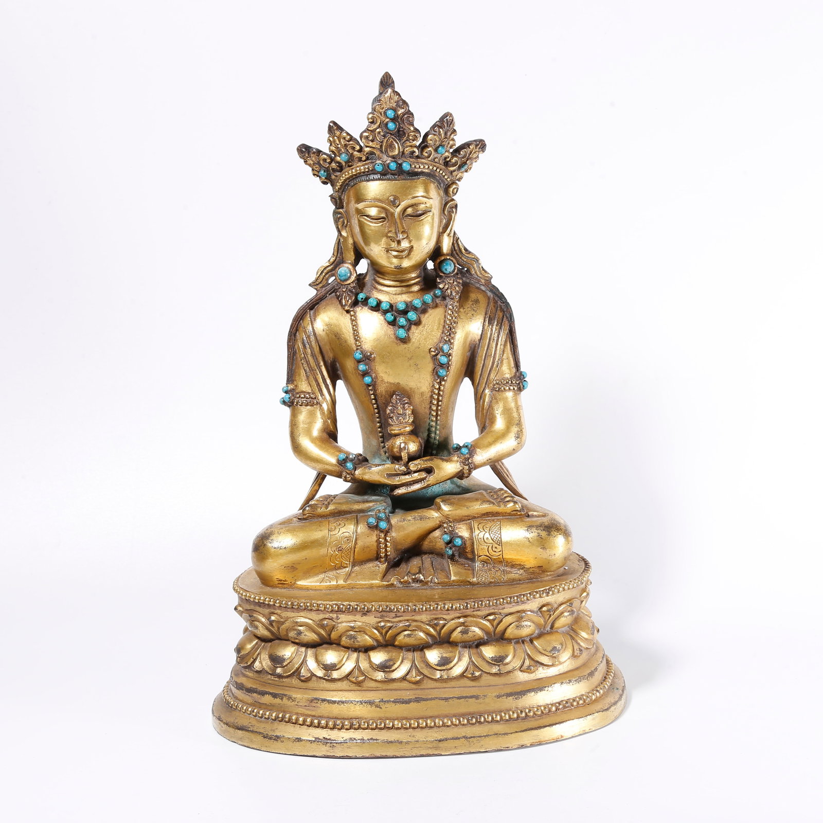 A GILT BRONZE STATUE OF MEDICINE BUDDHA: Gilt Bronze Statue of Medicine Buddha