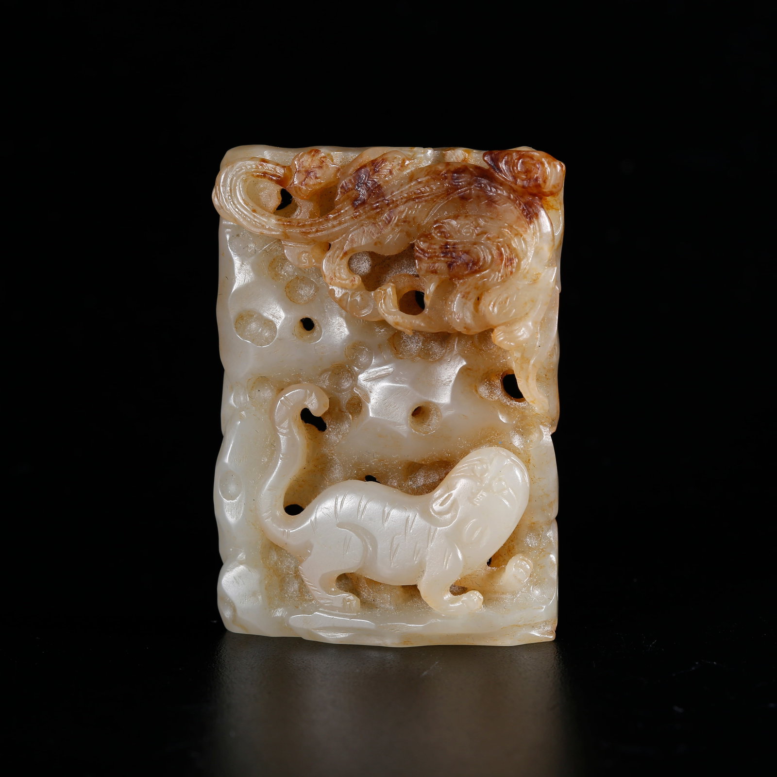 A HETIAN JADE CARVED PLAQUE WITH DRAGON AND TIGER PATTERN (1 of 9)