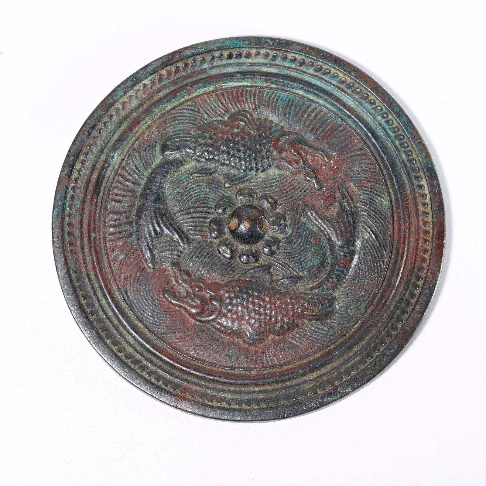 A BRONZE MIRROR WITH DOUBLE FISH PATTERN: Bronze Mirror with Double Fish Pattern