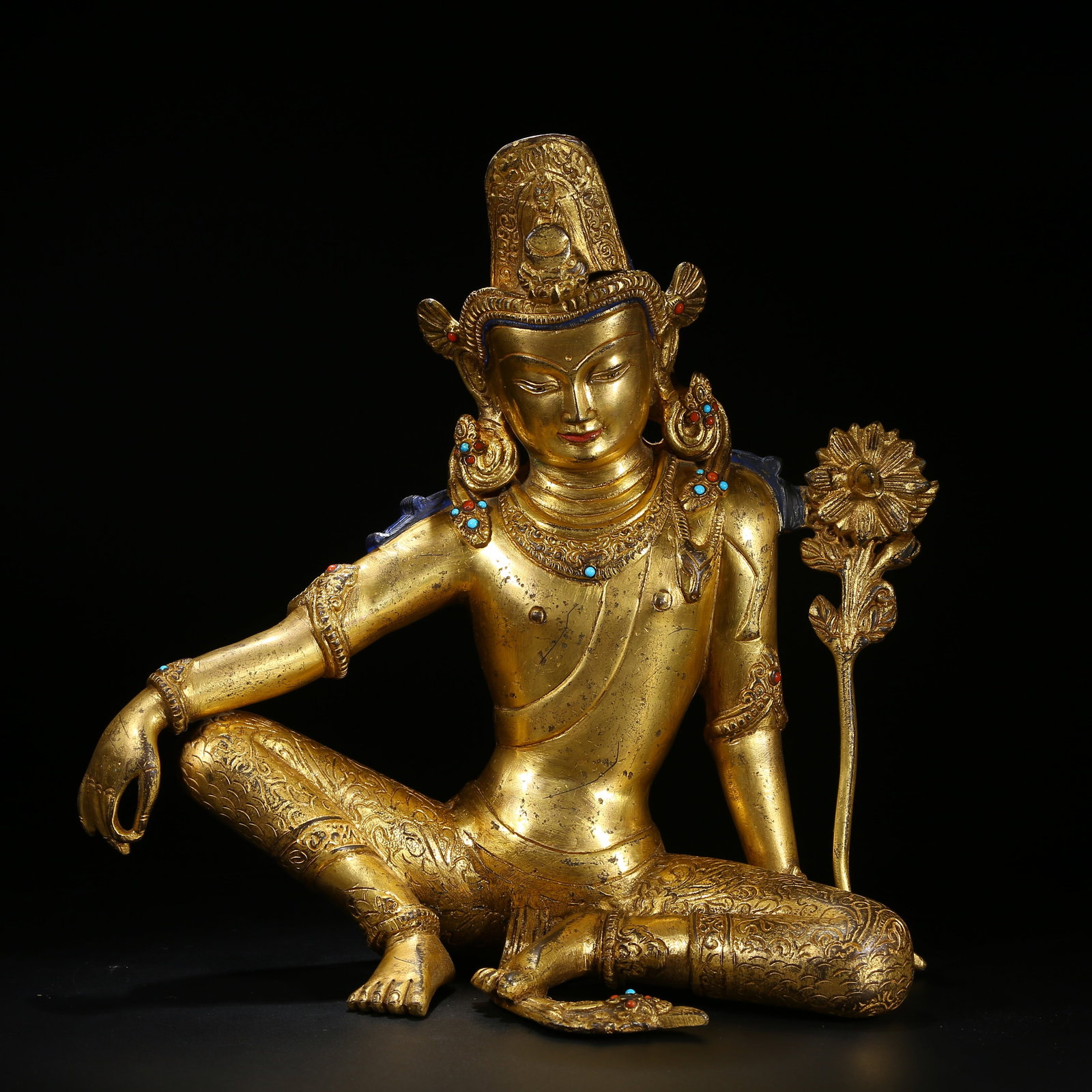 A GILT BRONZE STATUE OF PADMAPANI AVALOKITESHVARA INLAID WITH GEMS: Gilt Bronze Statue of Padmapani Avalokiteshvara Inlaid with Gems