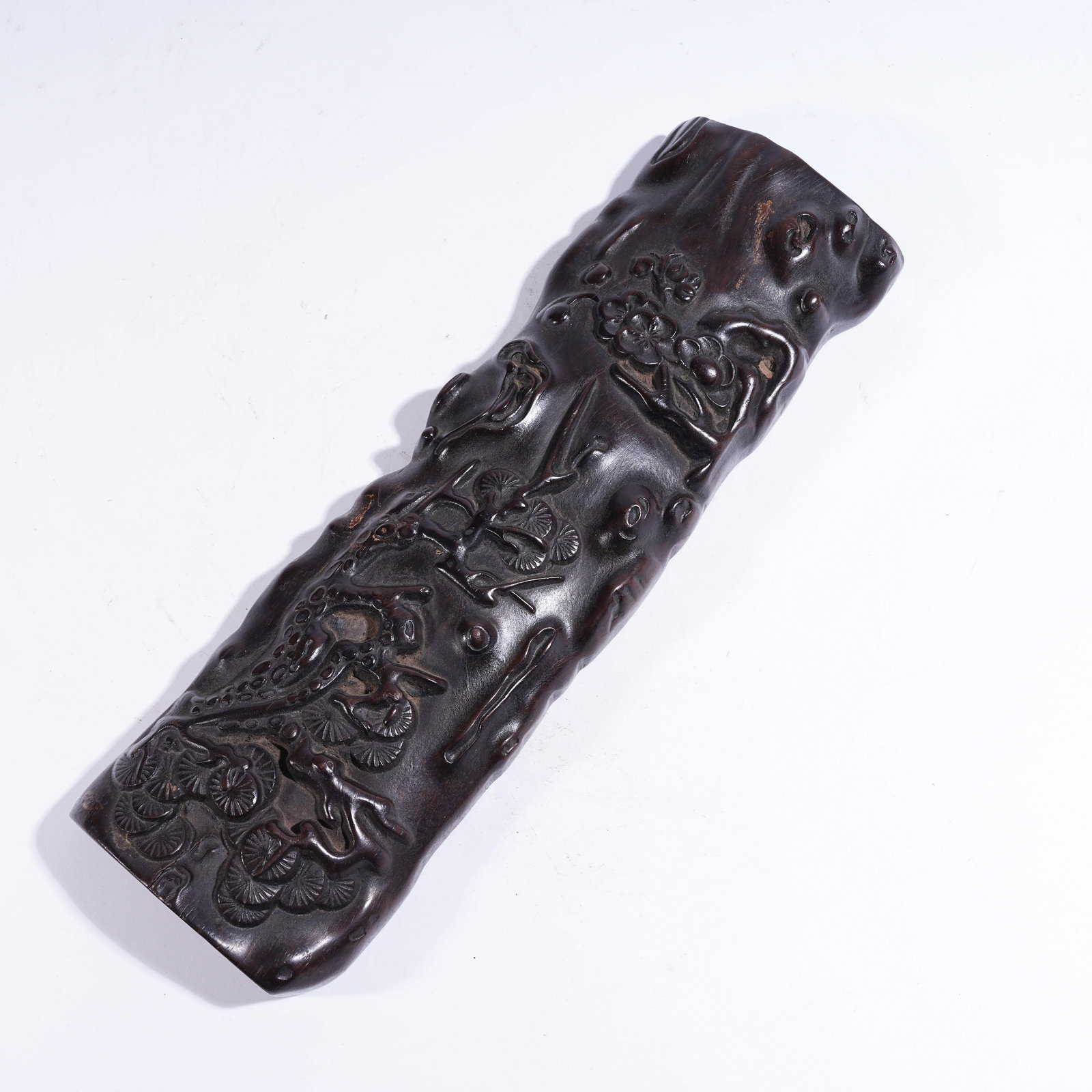 A ZITAN PAPERWEIGHT WITH FLORAL MOTIFS: Zitan Paperweight with Floral Motifs