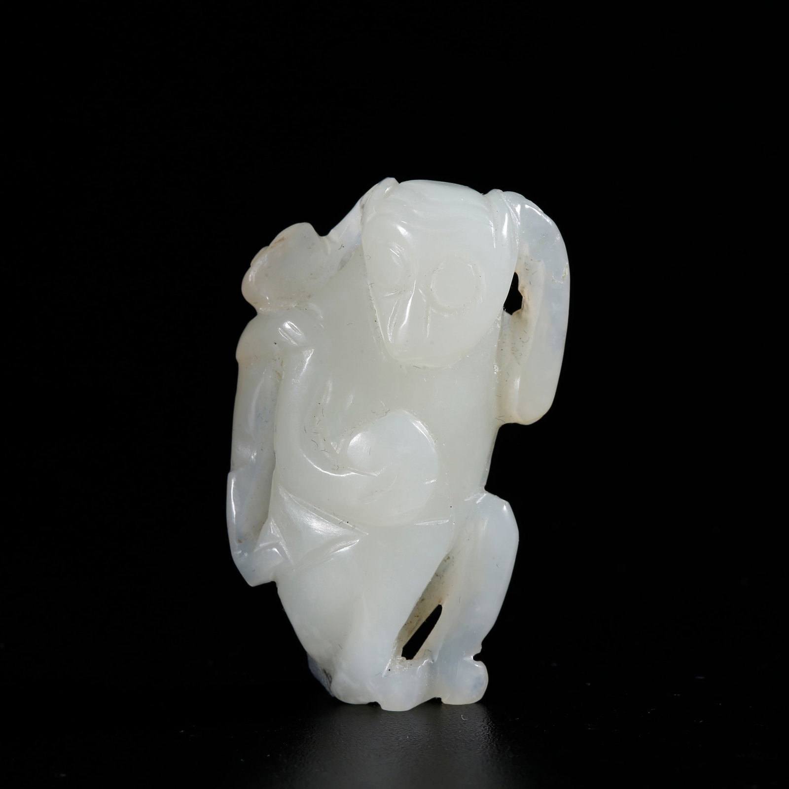 A HETIAN JADE CARVED MONKEY-SHAPED ORNAMENT (1 of 10)