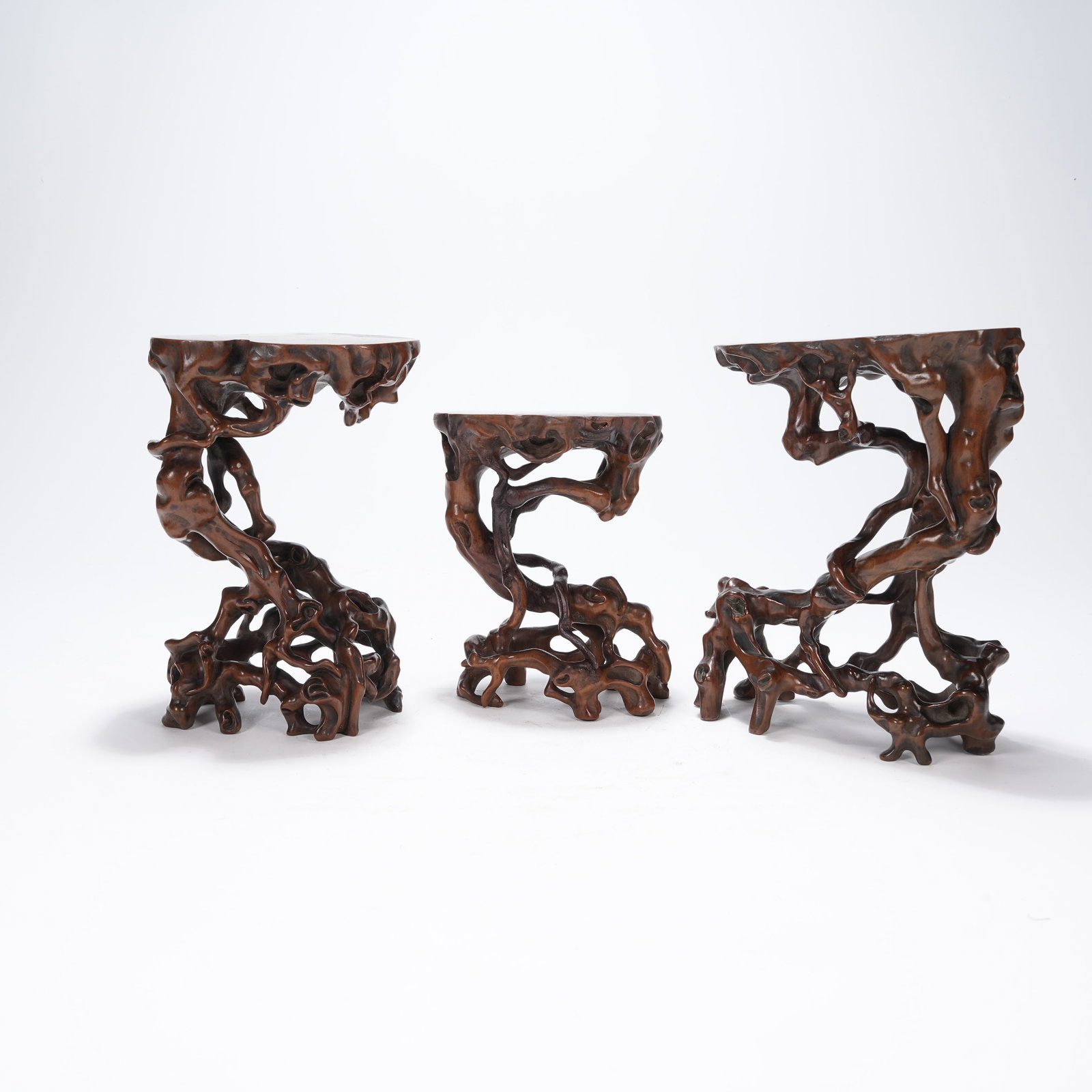 A GROUP OF BOXWOOD ROOT CARVED STANDS: Group of Boxwood Root Carved Stands