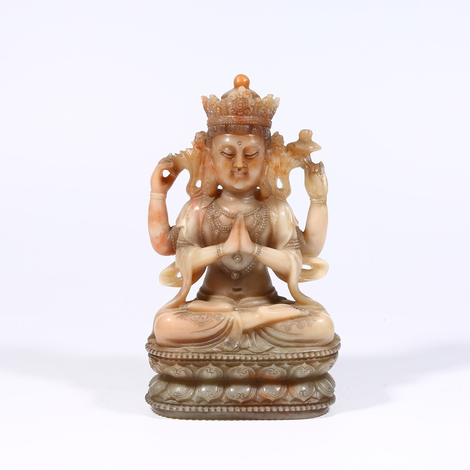 A SHOUSHAN STONE SCULPTURE OF FOUR-ARMED GUANYIN: Shoushan stone sculpture of four-armed Guanyin