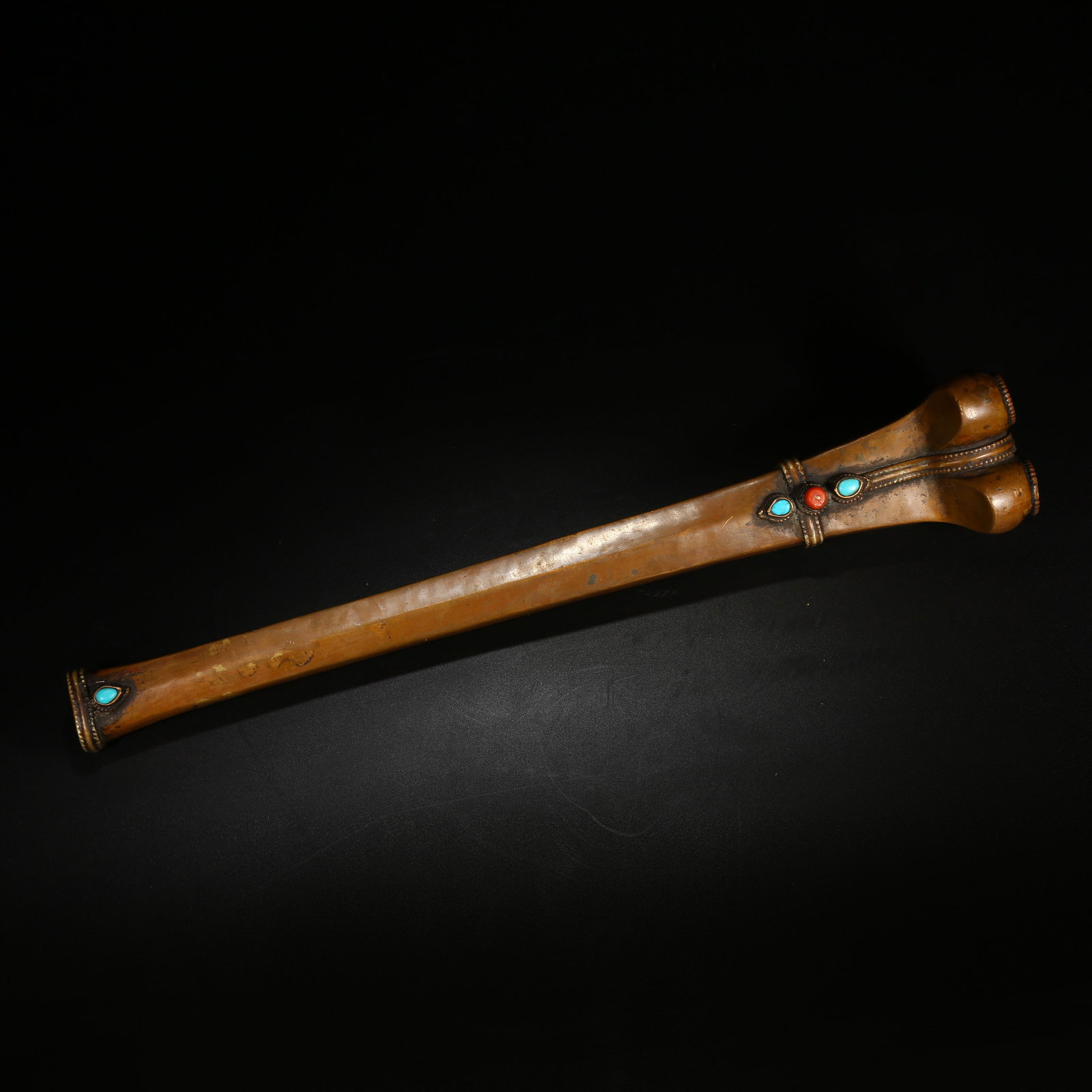 A BRONZE RELIC ORNAMENT INLAID WITH GEMS: Bronze Relic Ornament Inlaid with Gems