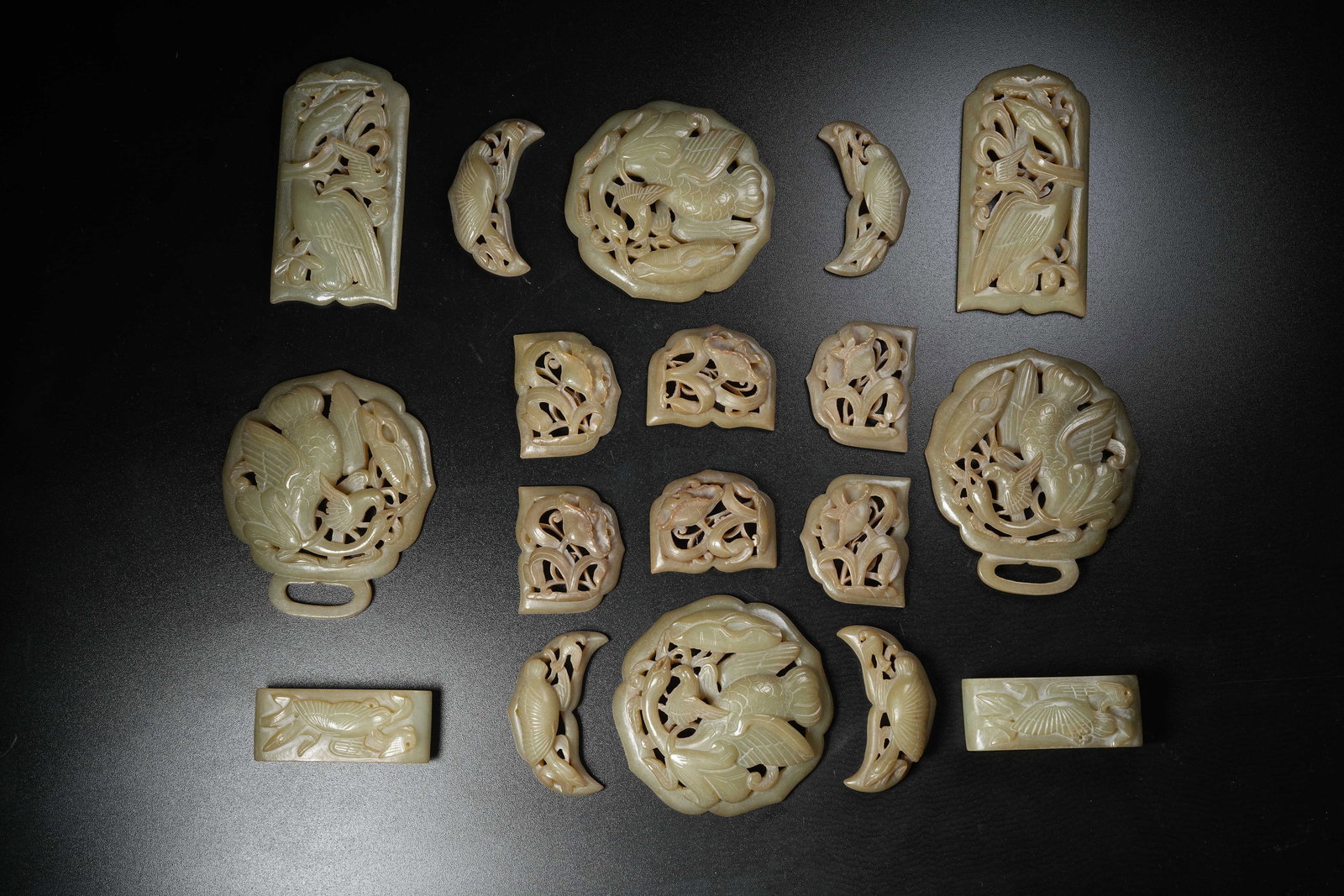 A GROUP OF HETIAN JADE BELT ORNAMENTS WITH AUTUMN MOUNTAIN SCENERY (1 of 16)