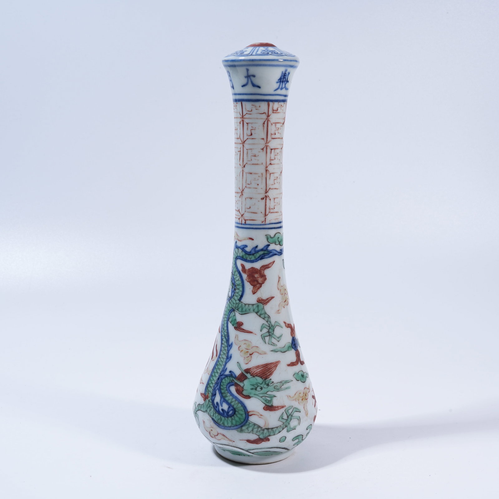 A BLUE-AND-WHITE WITH RED-AND-GREEN ENAMEL GARLIC-NECK VASE WITH "TWO DRAGONS PLAYING WITH A PEARL": Blue-and-White with Red-and-Green Enamel Garlic-Neck Vase with "Two Dragons Playing with a Pearl" Motif