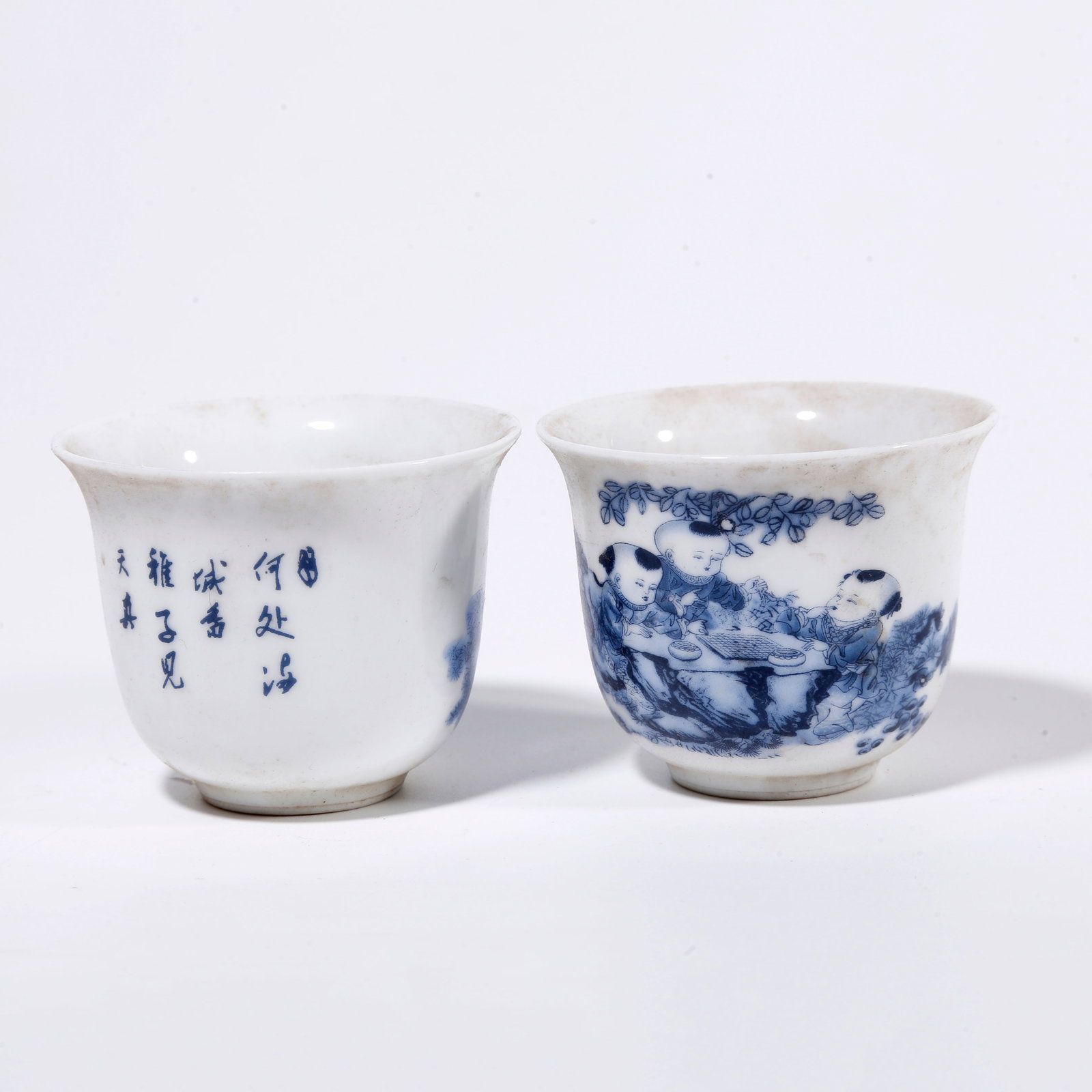 A PAIR OF BLUE AND WHITE CUPS WITH CHILDREN AT PLAY PATTERN (1 of 9)