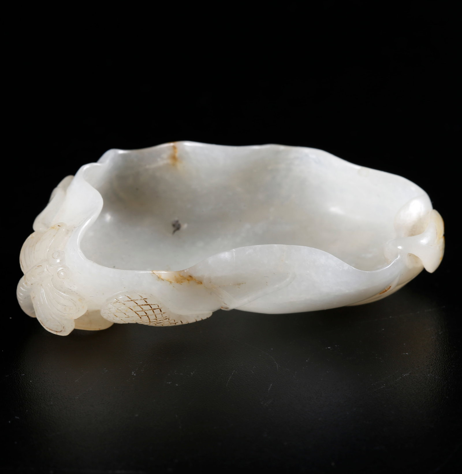 A HETIAN JADE CARVED LOTUS-SHAPED WASHER (1 of 9)