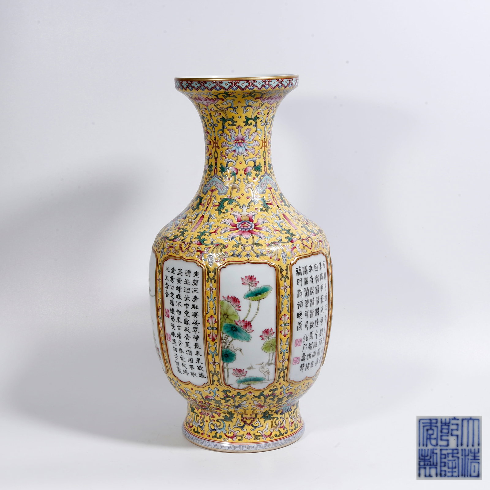 A YELLOW-GROUND FAMILLE-ROSE VASE WITH FLORAL MEDALLIONS IN CARTOUCHES: Yellow-Ground Famille-Rose Vase with Floral Medallions in Cartouches