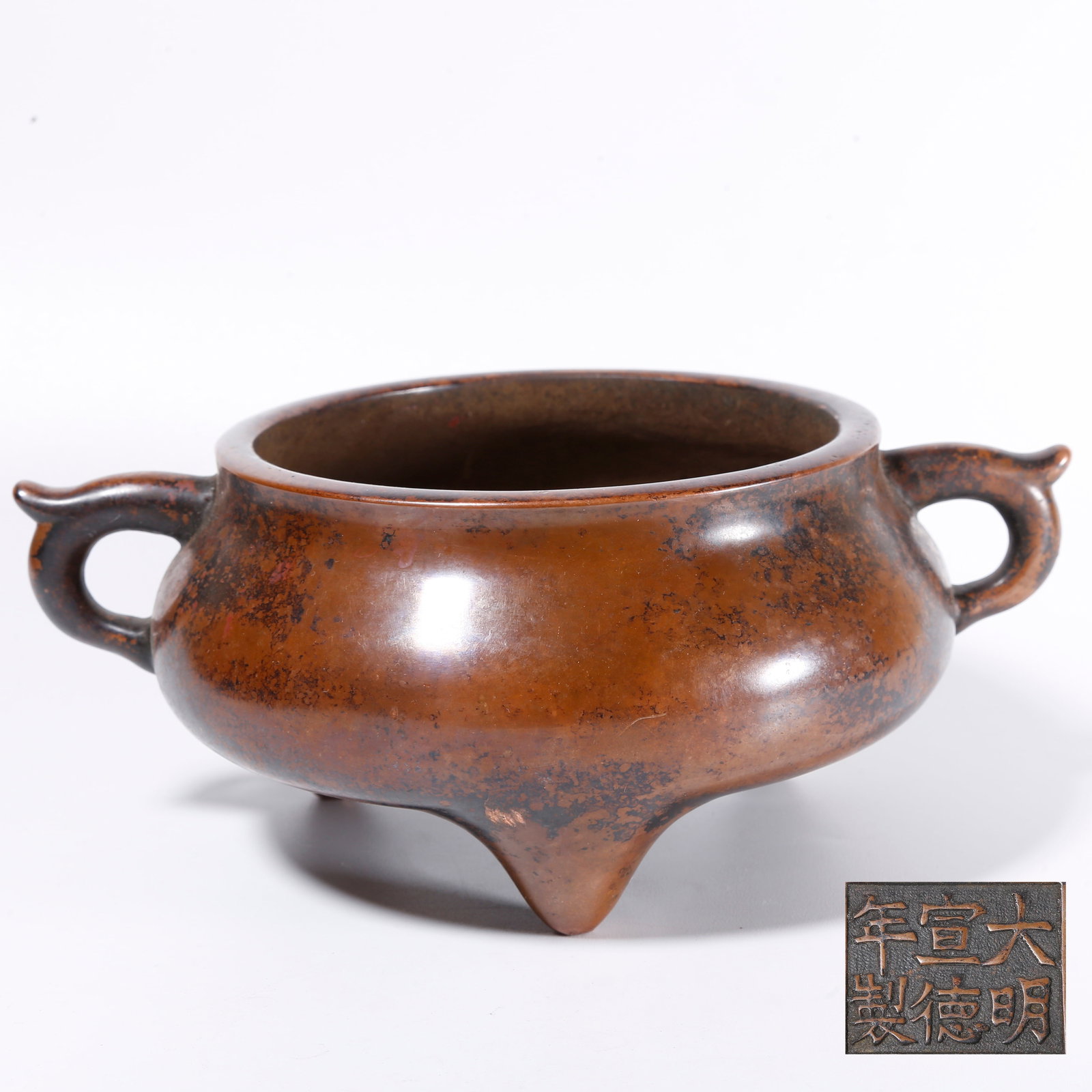 A BRONZE DOUBLE-EARED THREE-LEGGED CENSER (1 of 11)
