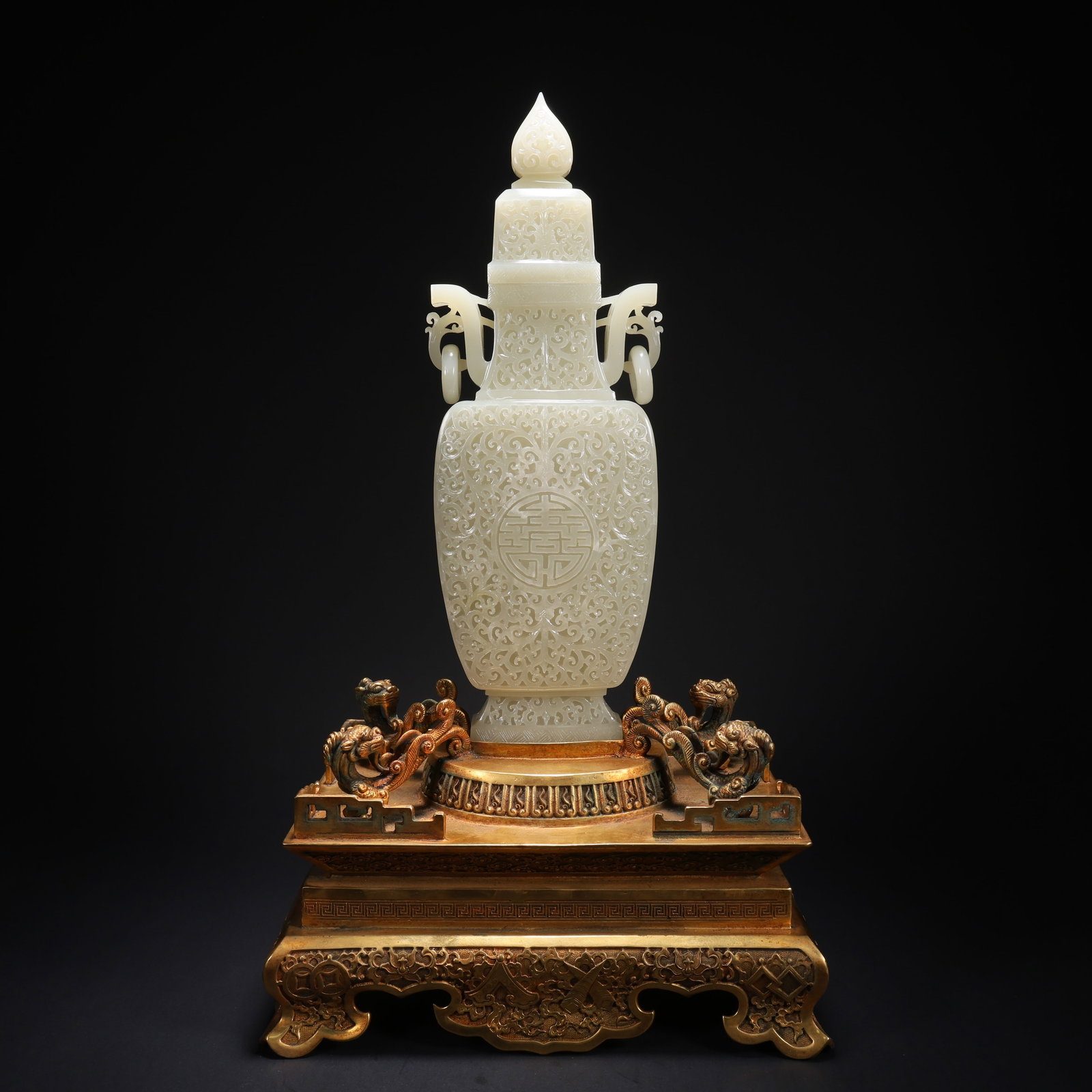 A HETIAN JADE GILDED BRONZE FOUR-DRAGON BASE DOUBLE-RING FLORAL BOTTLE: Hetian Jade Gilded Bronze Four-Dragon Base Double-Ring Floral Bottle