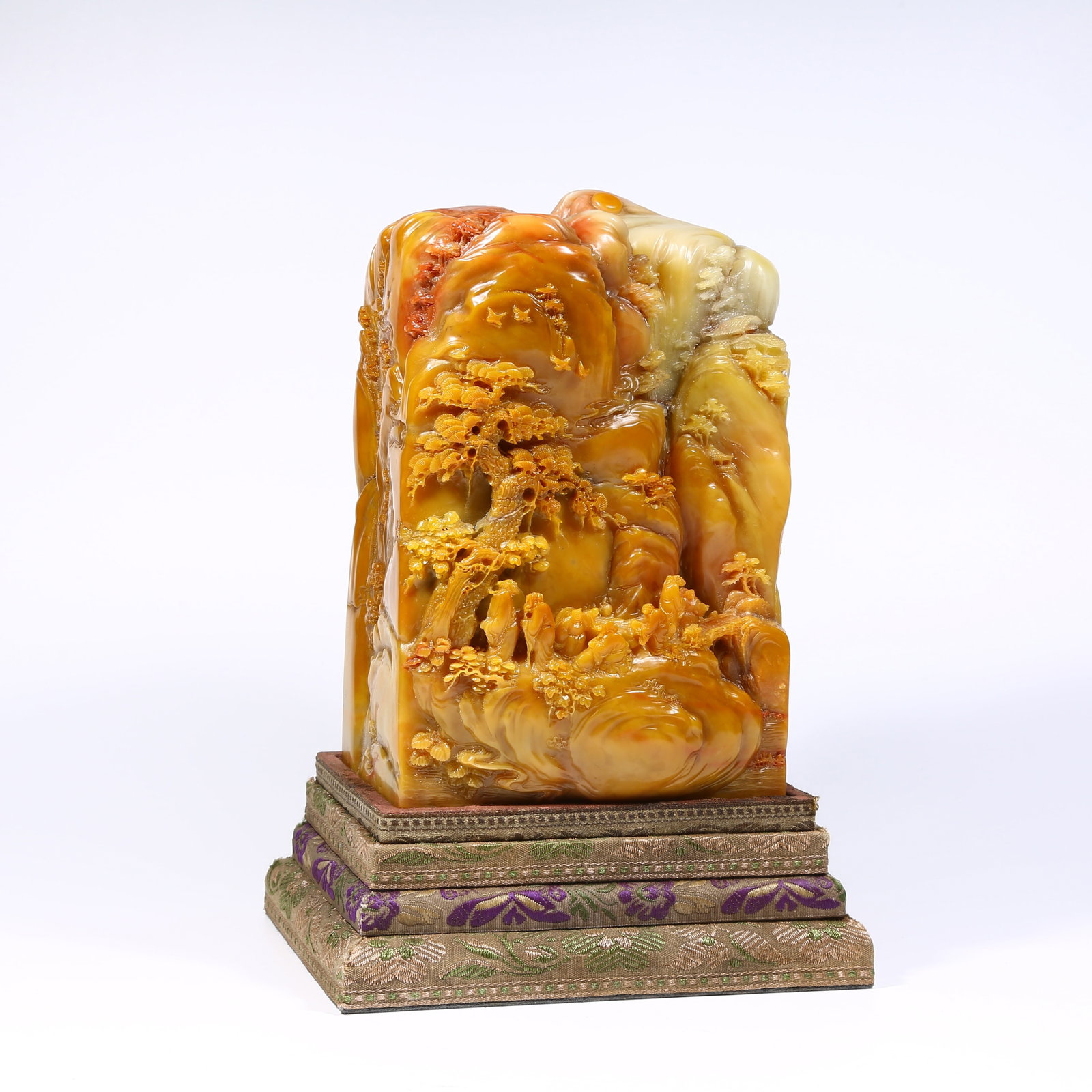 A LARGE SHOUSHAN STONE SEAL WITH LANDSCAPE, FIGURES, AND STORY DESIGN: Large Shoushan stone seal with landscape, figures, and story design
