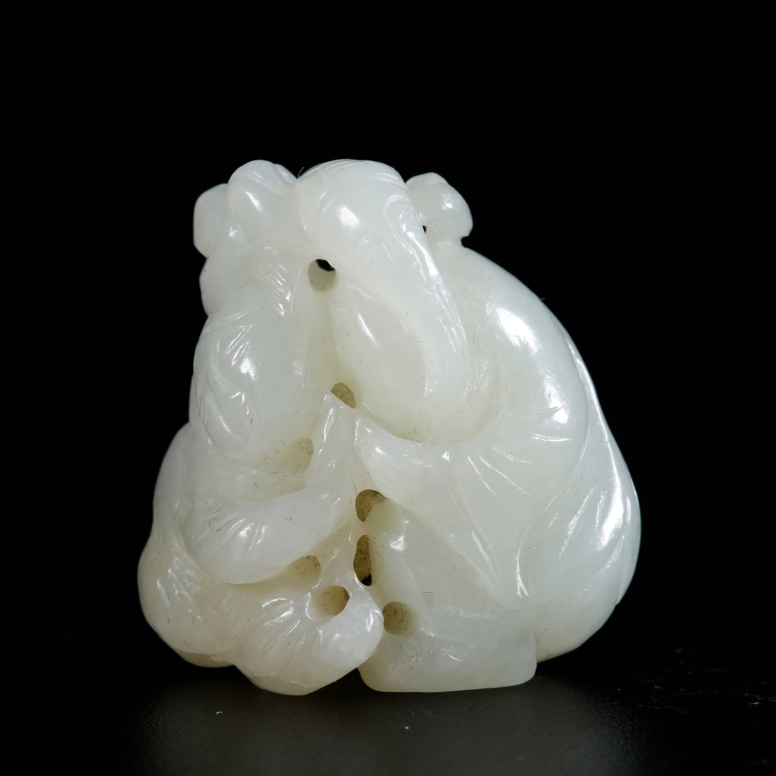 A HETIAN JADE CARVED FIGURE-SHAPED ORNAMENT: Hetian Jade Carved Figure-shaped Ornament
