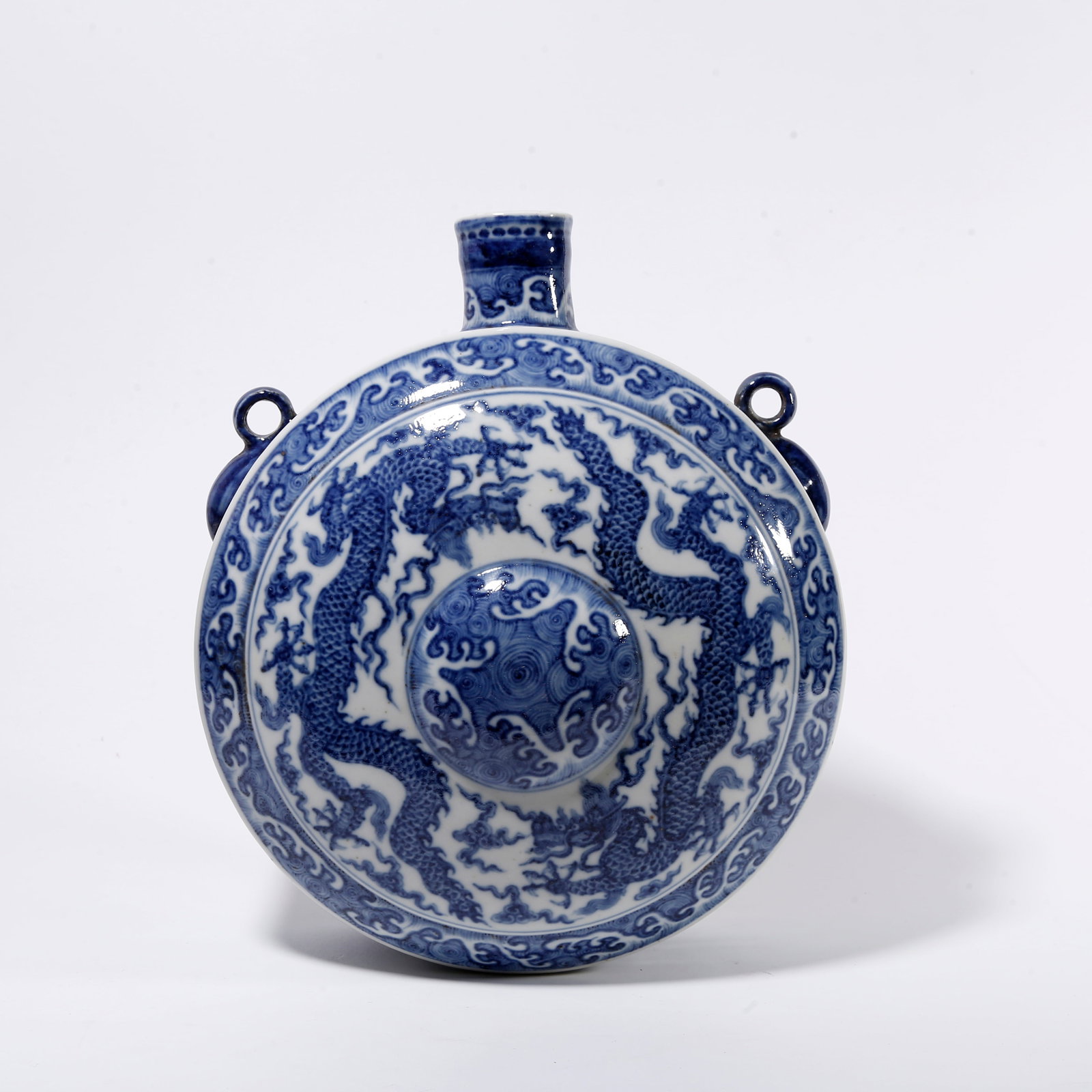 A BLUE AND WHITE WALL VASE WITH DOUBLE DRAGON PATTERN: Blue and White Wall Vase with Double Dragon Pattern