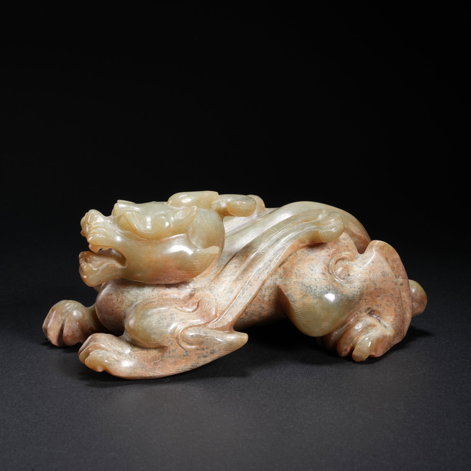A HETIAN JADE CHI TIGER-SHAPED ORNAMENT: Hetian Jade Chi Tiger-Shaped Ornament