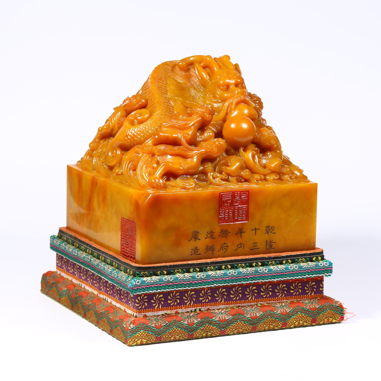 A LARGE SHOUSHAN TIANHUANG STONE SEAL WITH AO FISH KNOB: Large Shoushan Tianhuang stone seal with ao fish knob