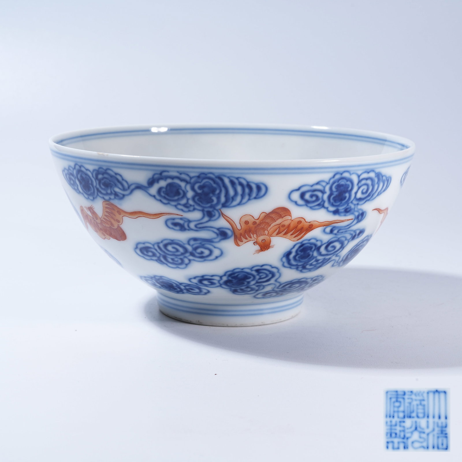 A BLUE-AND-WHITE WITH IRON-RED BOWL WITH "TEN THOUSAND BLESSINGS" DESIGN: Blue-and-White with Iron-Red Bowl with "Ten Thousand Blessings" Design
