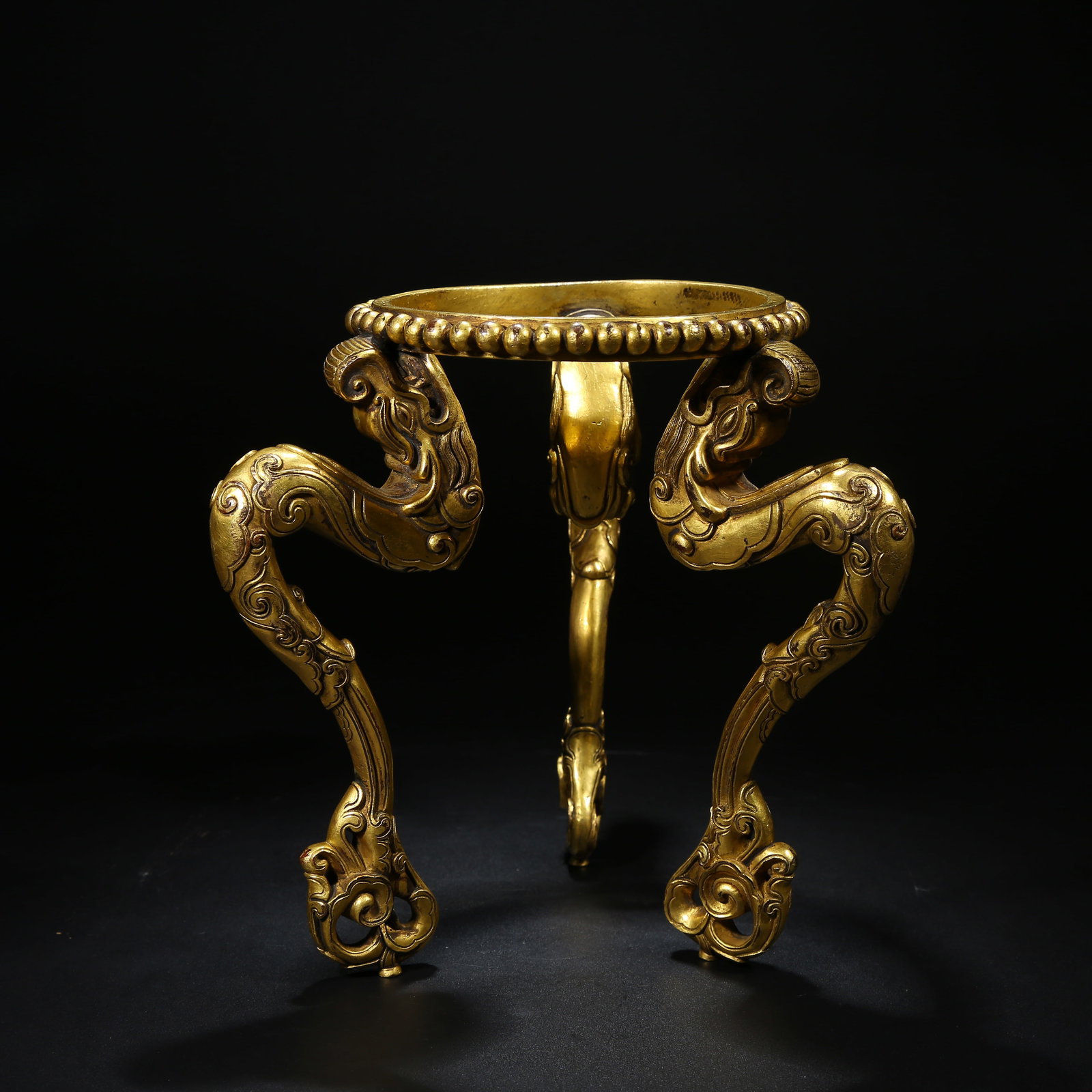 A GILT BRONZE GABALA (SKULL CUP) BASE (1 of 10)