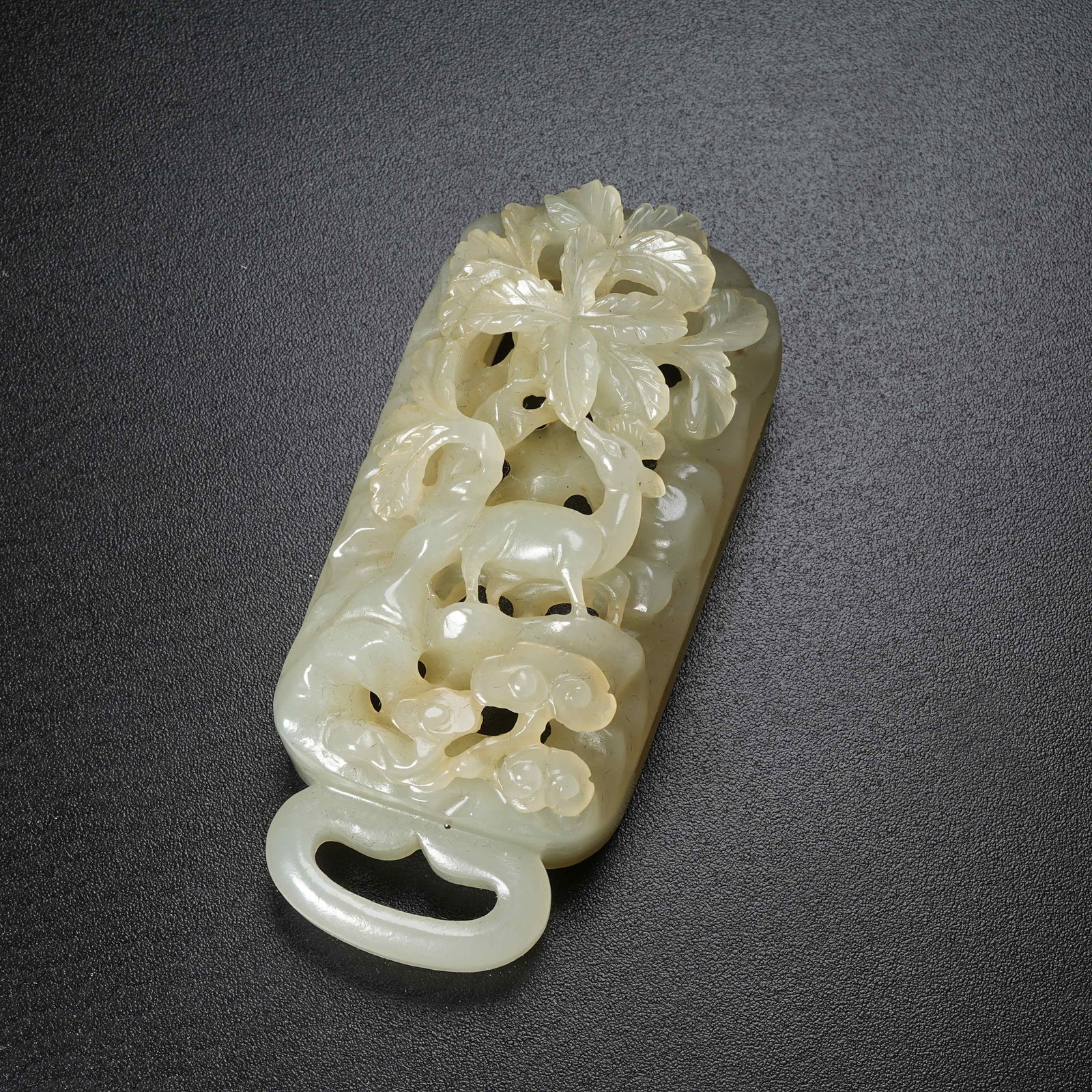 A HETIAN JADE WAIST ORNAMENT WITH AUTUMN MOUNTAIN SCENERY: Hetian Jade Waist Ornament with Autumn Mountain Scenery