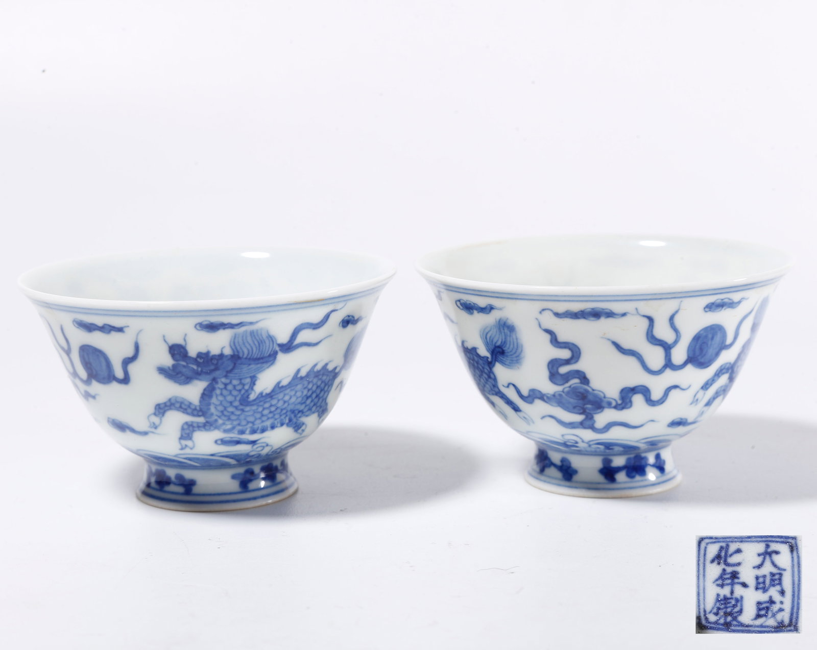 A BLUE AND WHITE CUP WITH QILIN PATTERN (PAIR): Blue and White Cup with Qilin Pattern (Pair)