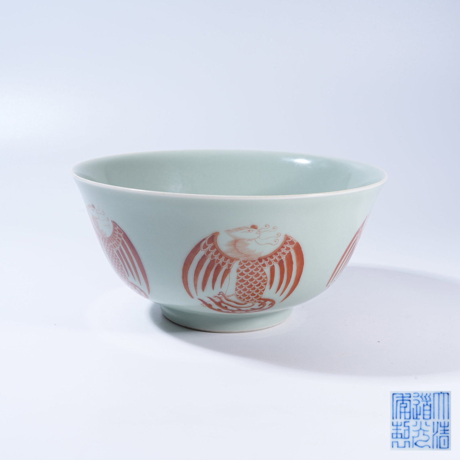 A IRON-RED LARGE BOWL WITH MEDALLIONS OF PHOENIXES: Iron-Red Large Bowl with Medallions of Phoenixes