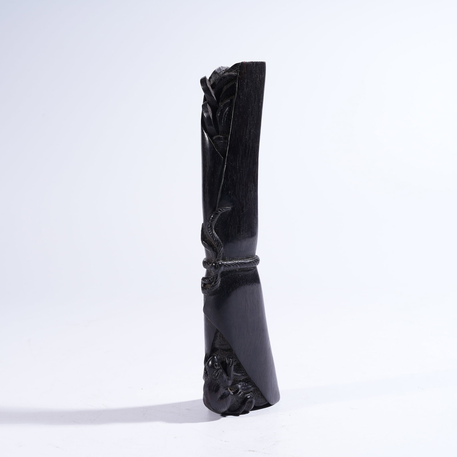 A ZITAN BRUSH REST WITH "TREASURE-SEEKING MOUSE" MOTIF: Zitan Brush Rest with "Treasure-Seeking Mouse" Motif