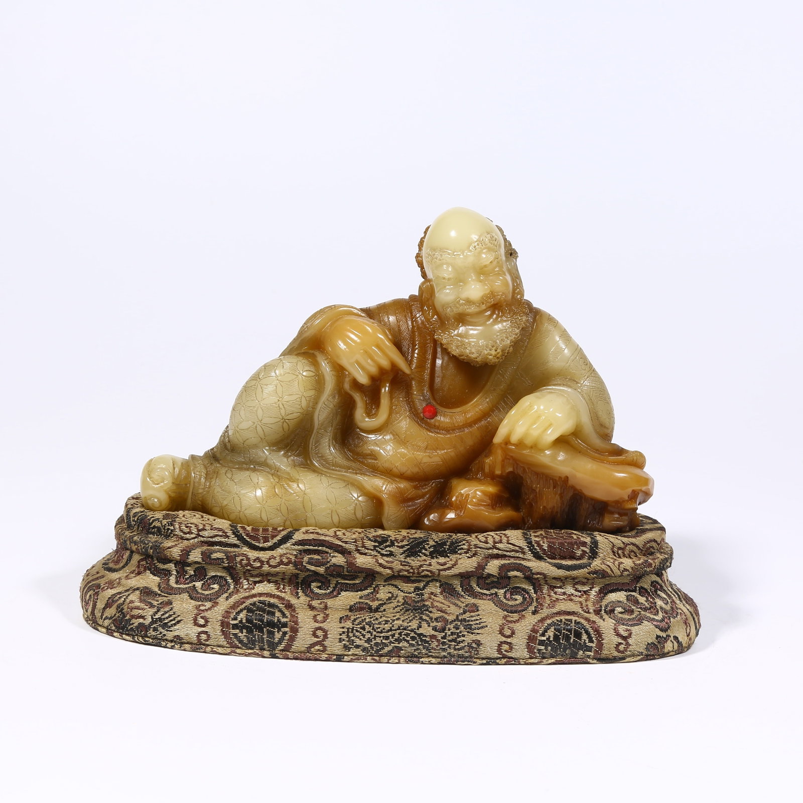 A SHOUSHAN STONE ARHAT FIGURINE: Shoushan stone Arhat figurine