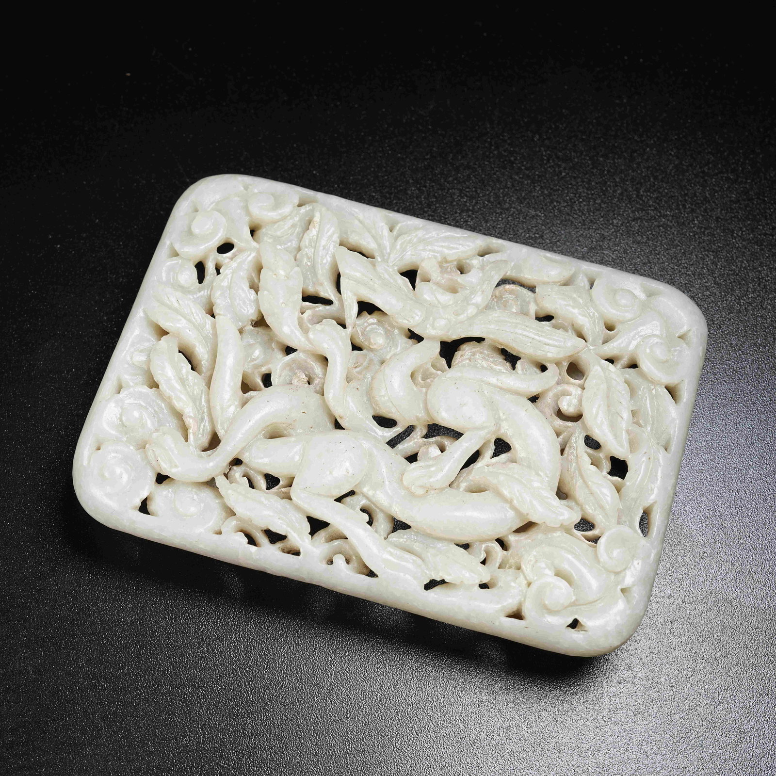 A HOTAN JADE BELT ORNAMENT WITH INTERWOVEN FLOWER AND DRAGON PATTERN (1 of 9)