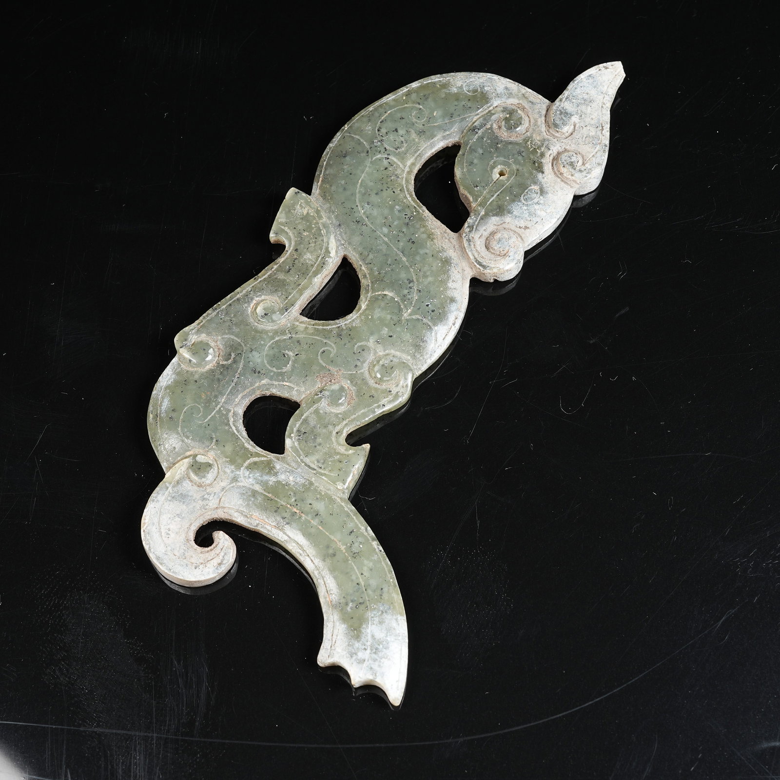 A ANCIENT JADE S-SHAPED DRAGON PENDANT: Ancient Jade S-shaped Dragon Pendant