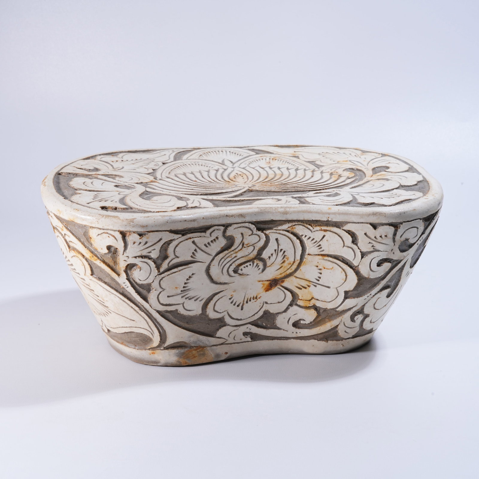 A DING KILN INCISED PILLOW (1 of 9)