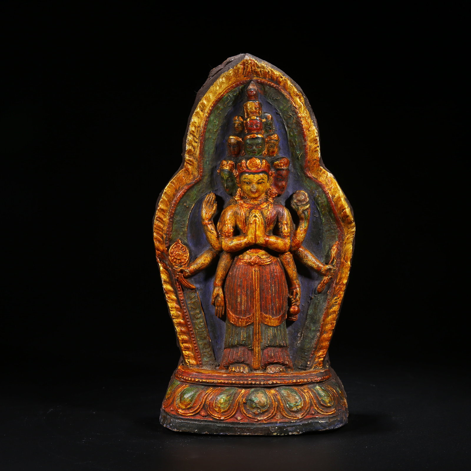 A CLAY ELEVEN-HEADED AVALOKITESHVARA TSA-TSA: Clay Eleven-Headed Avalokiteshvara Tsa-Tsa