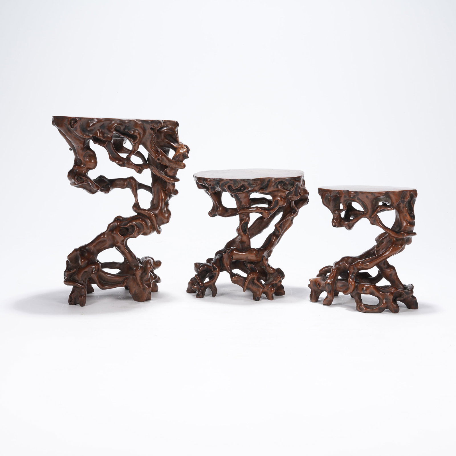 A GROUP OF BOXWOOD ROOT CARVED STANDS: Group of Boxwood Root Carved Stands